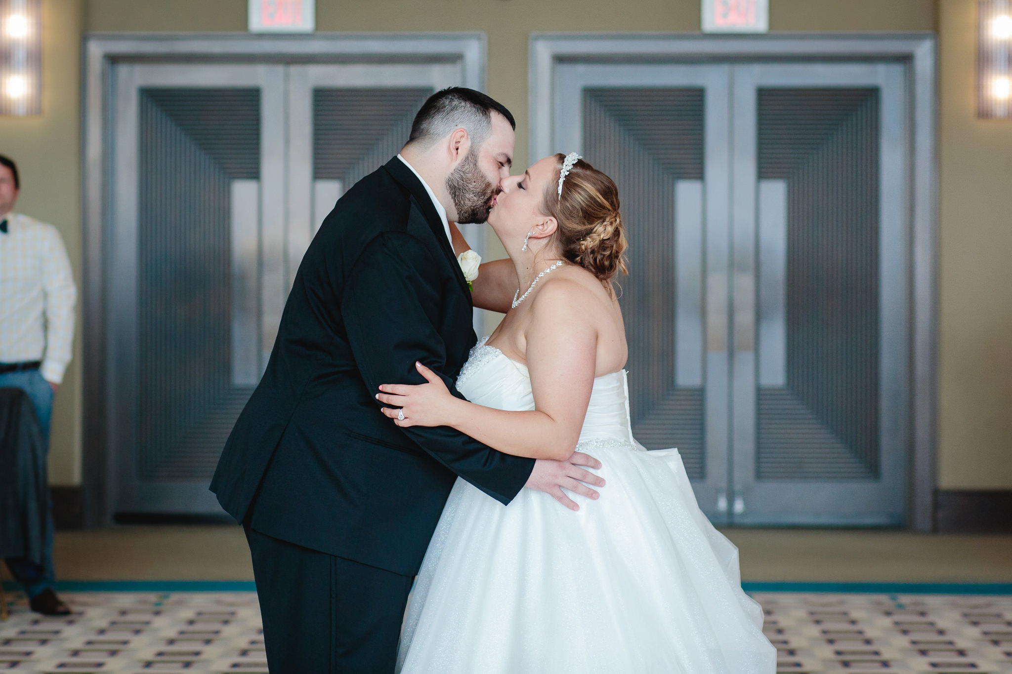 Bride & groom kiss during their first dance at Duquesne University