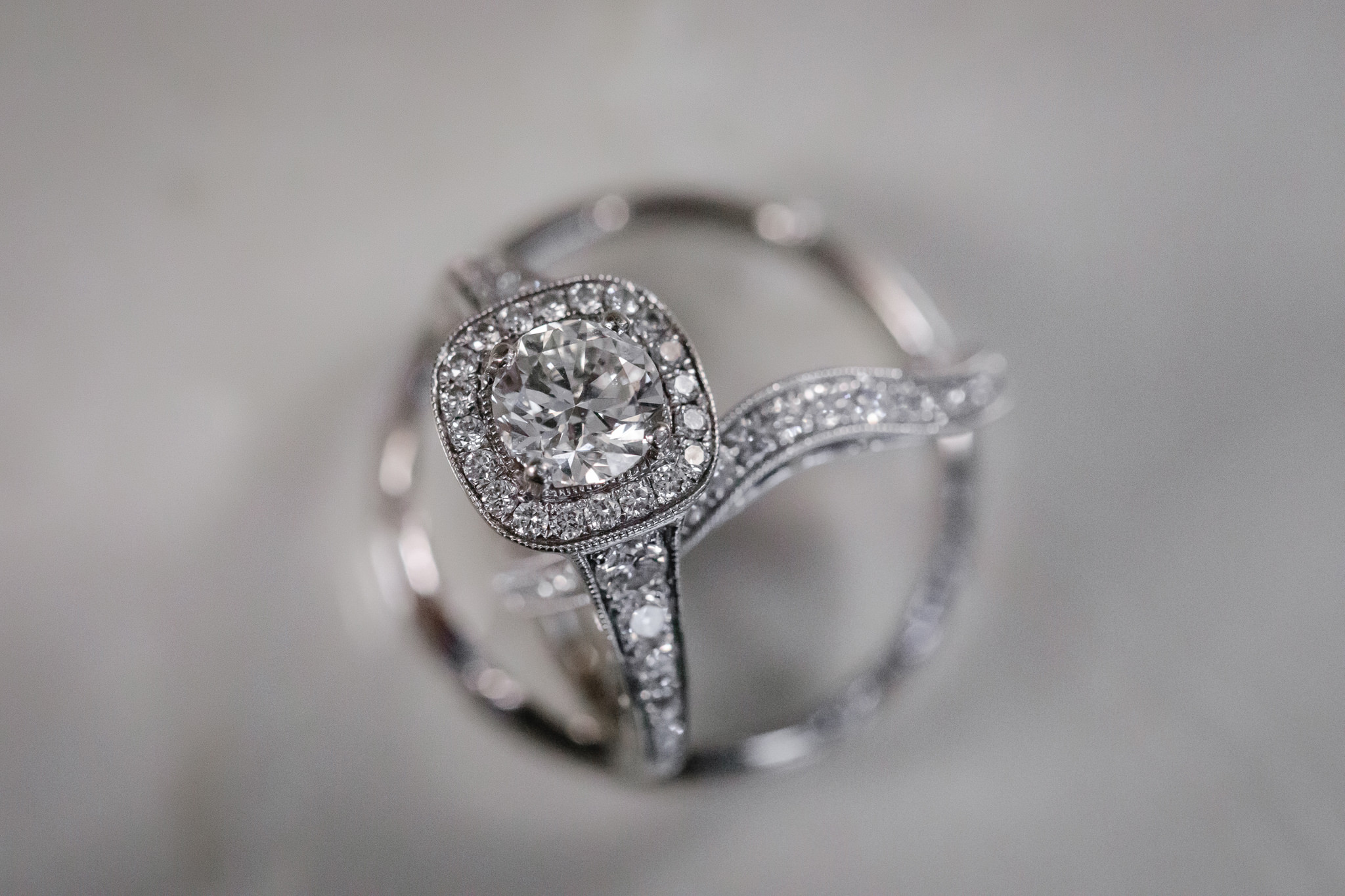 Diamond engagement ring propped up by a wedding band