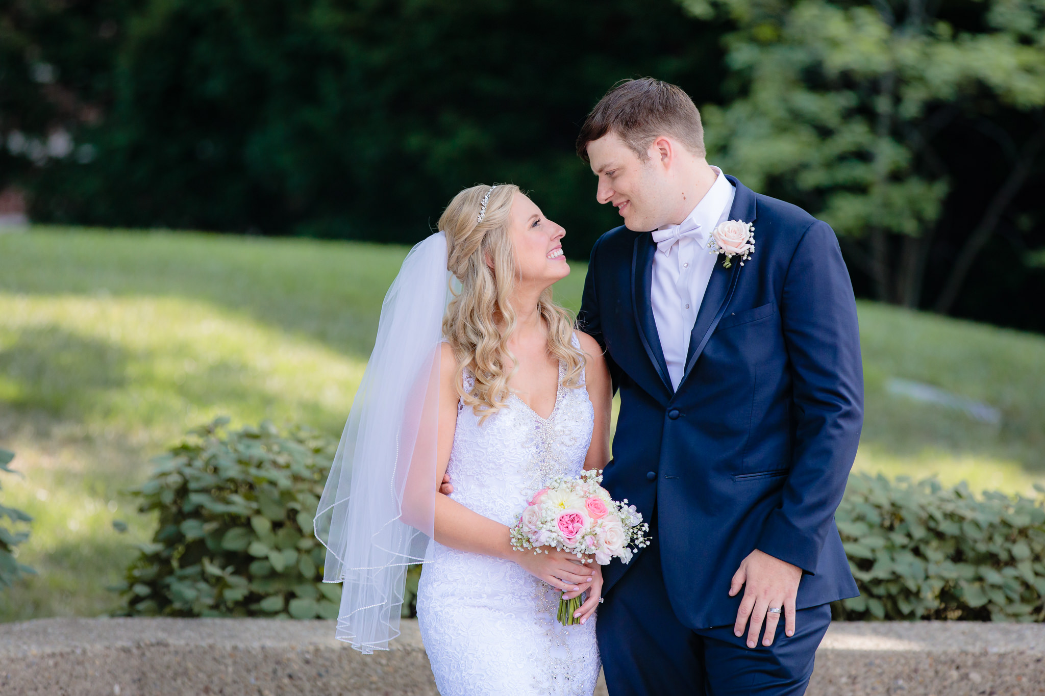 Bride & groom look at each other at Duquesne University