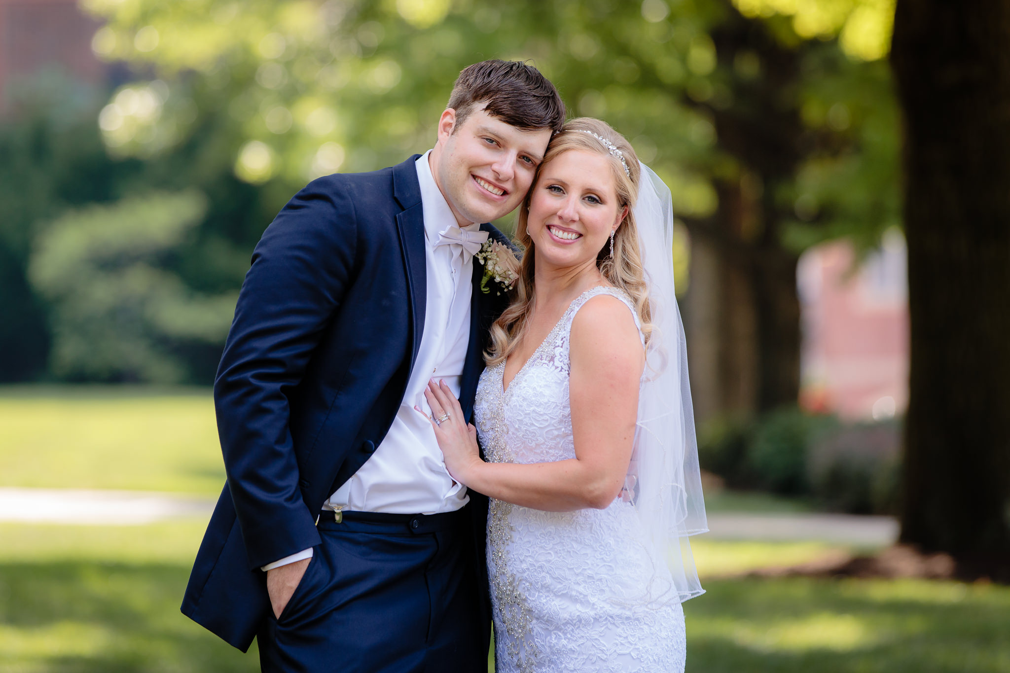 Bride & groom pose for portraits at their wedding at Duquesne University