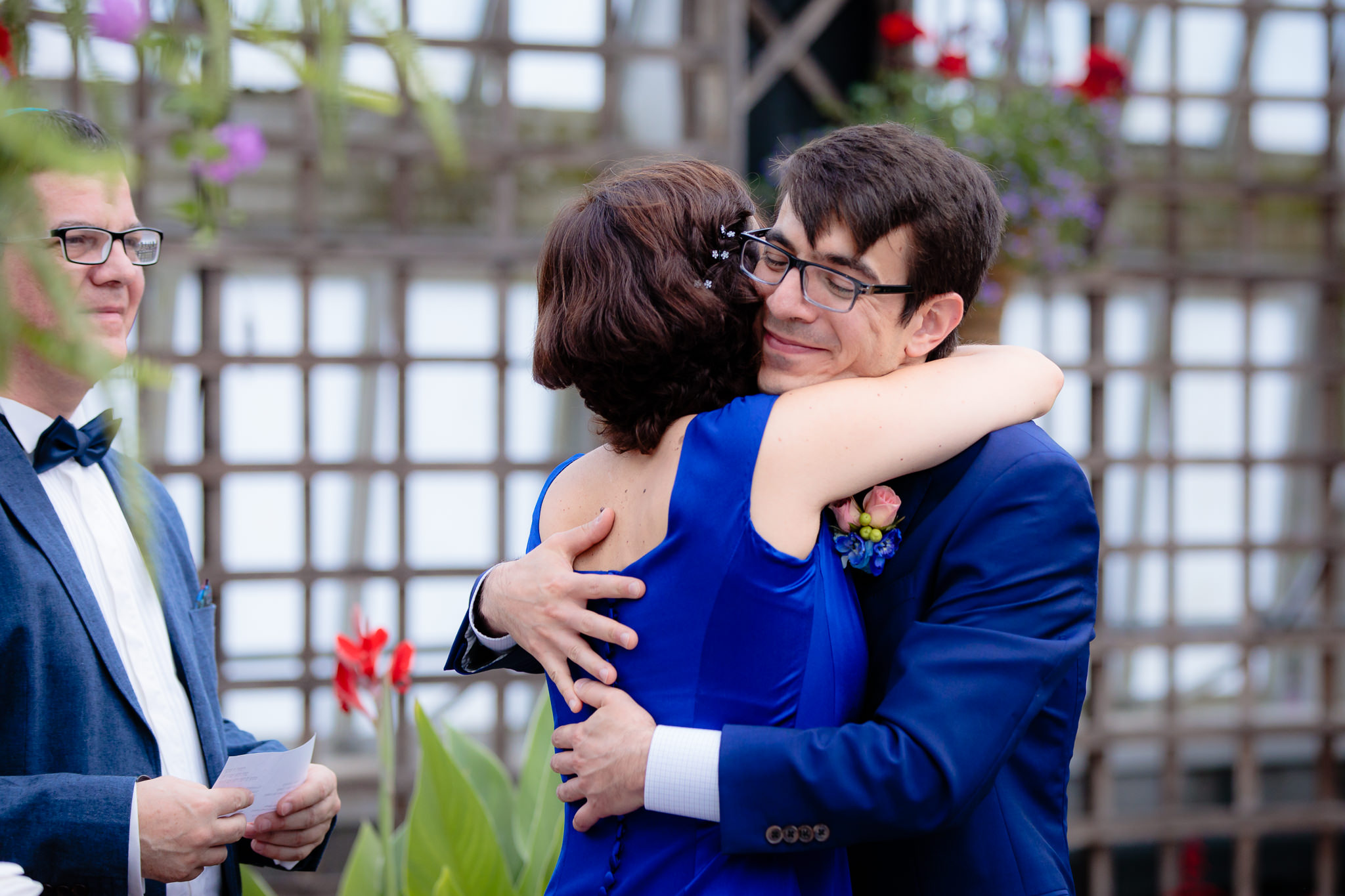 Groom hugs his mom after the Ketubah signing at Phipps Conservatory