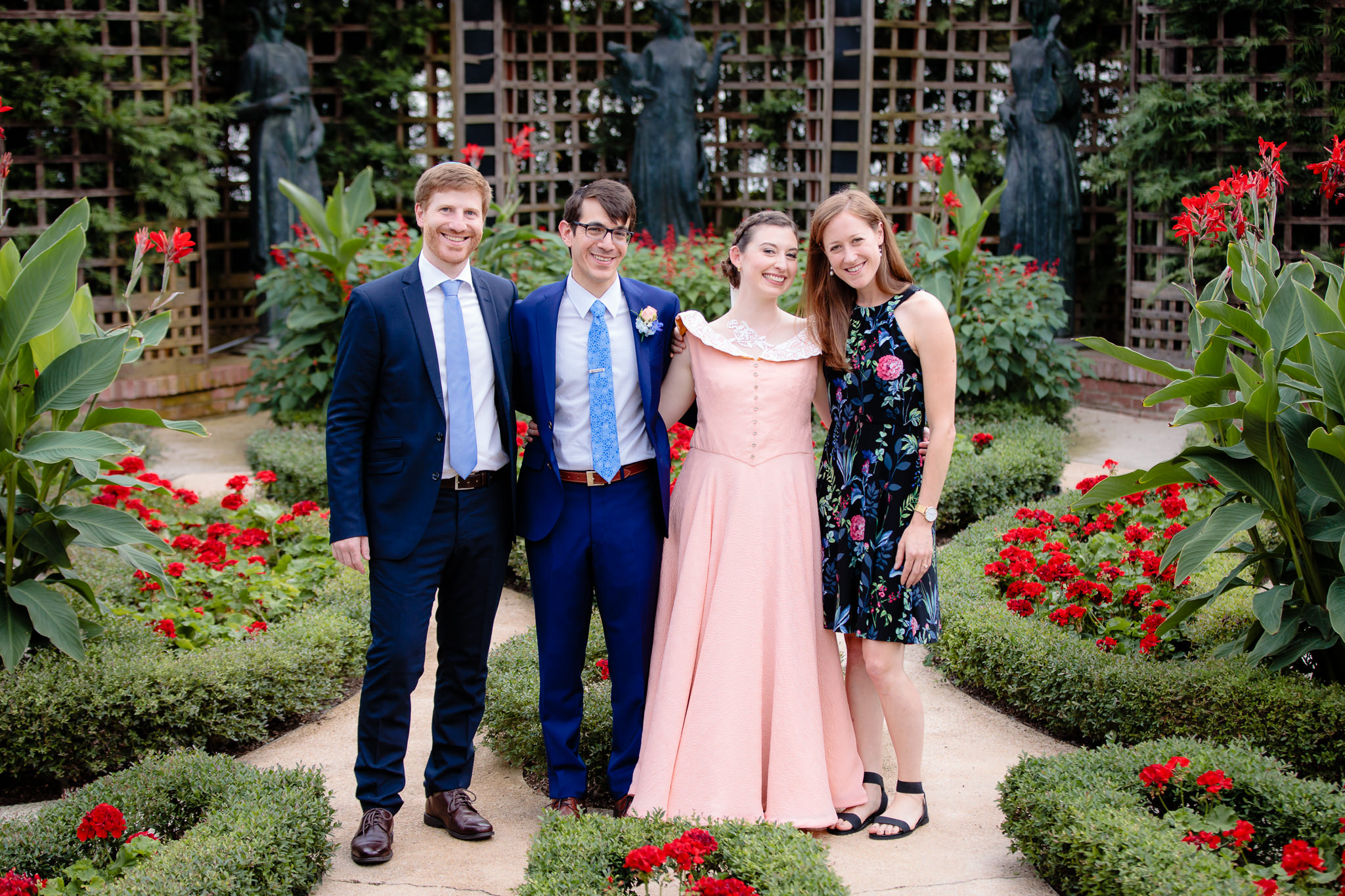 Bride & groom pose with their witnesses in the Broderie Room at Phipps Conservatory