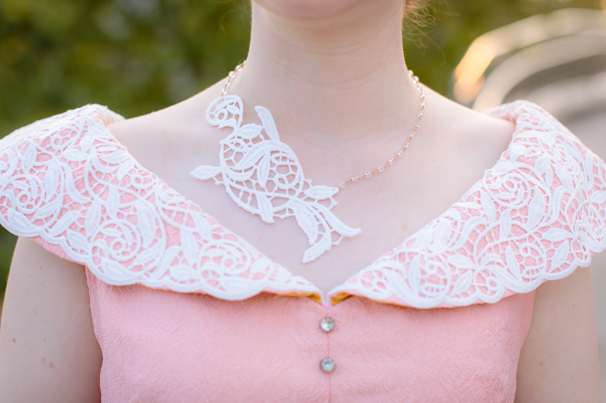 Lace details of the bride's custom-made pink dress at Phipps Conservatory