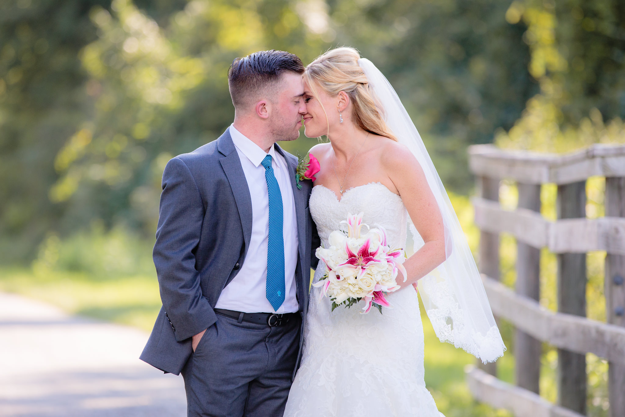 Bride and groom share a moment before their Pittsburgh Airport Marriott wedding