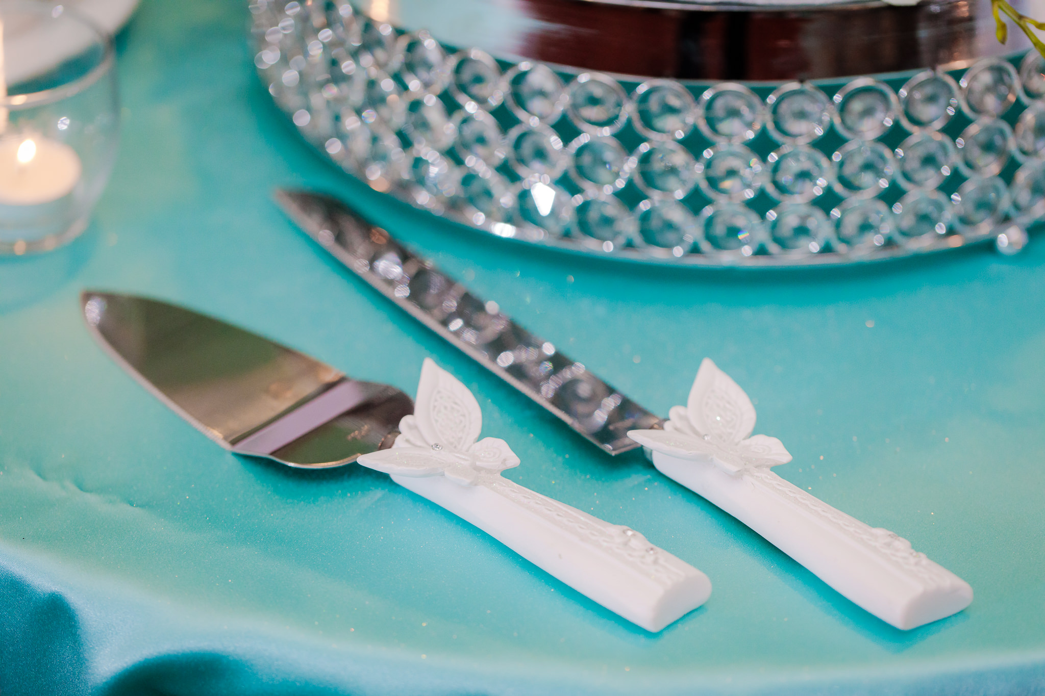 White butterfly cake knife and cake server at a Pittsburgh Airport Marriott reception