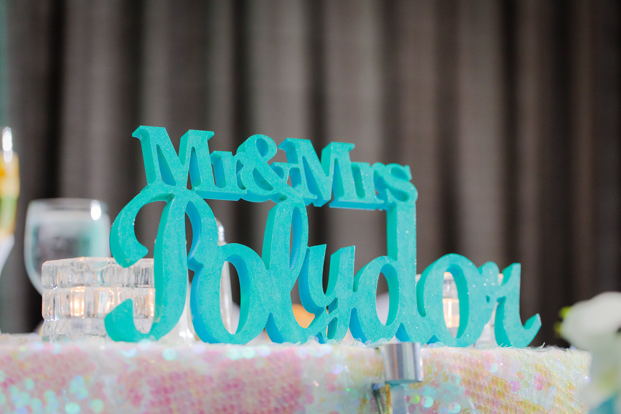 Custom turquoise Mr. & Mrs. sign at a Pittsburgh Airport Marriott wedding