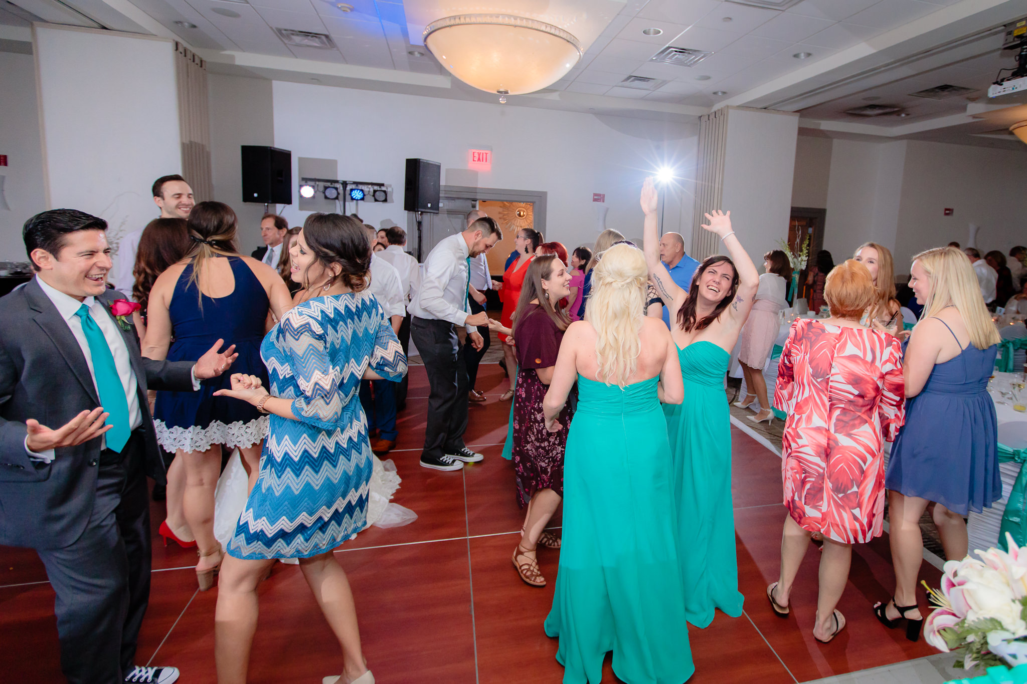 Guests fill the dance floor at a Pittsburgh Airport Marriott wedding reception