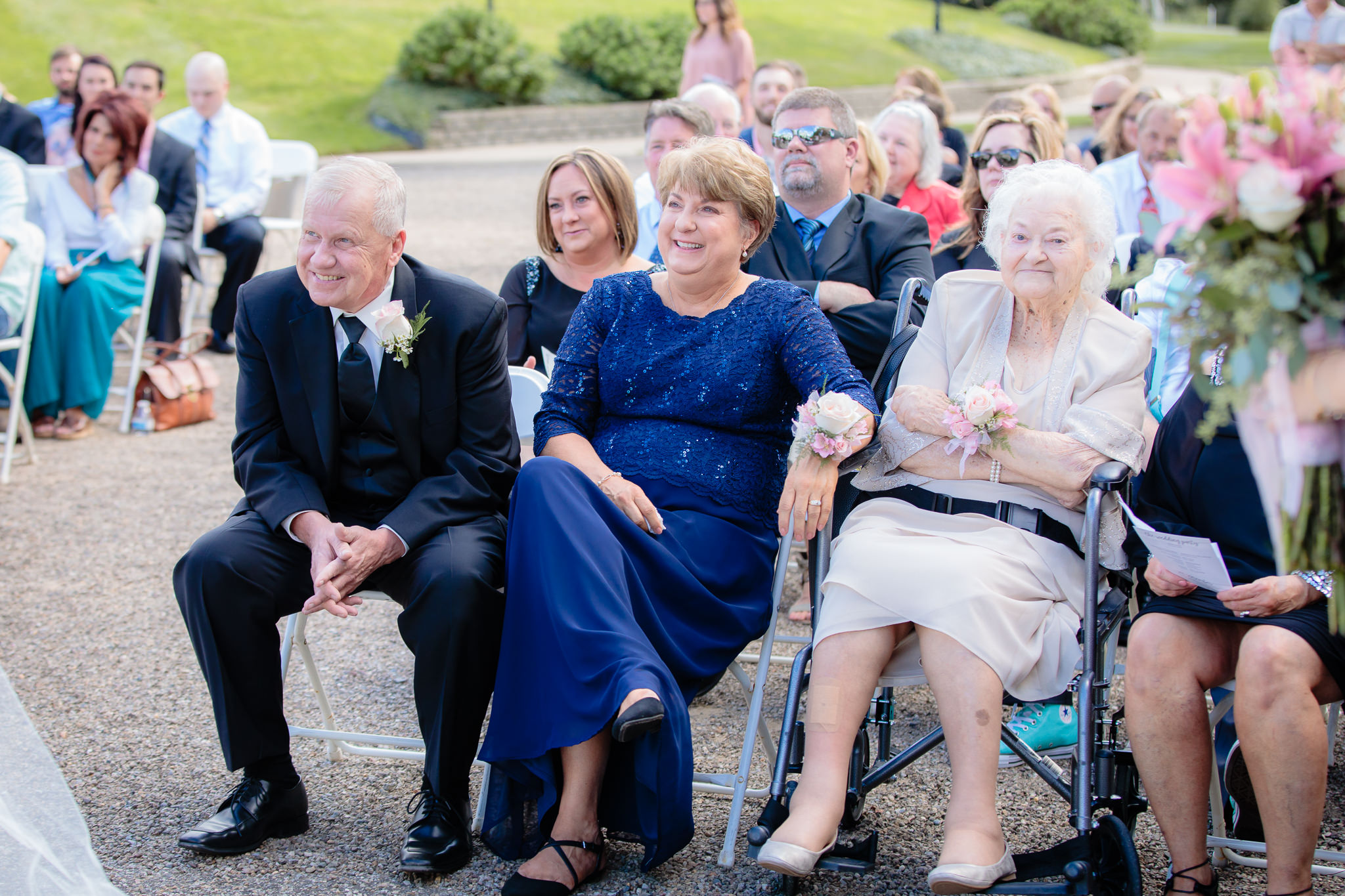 Parents & grandmother of the bride enjoy the ceremony at Greystone Fields