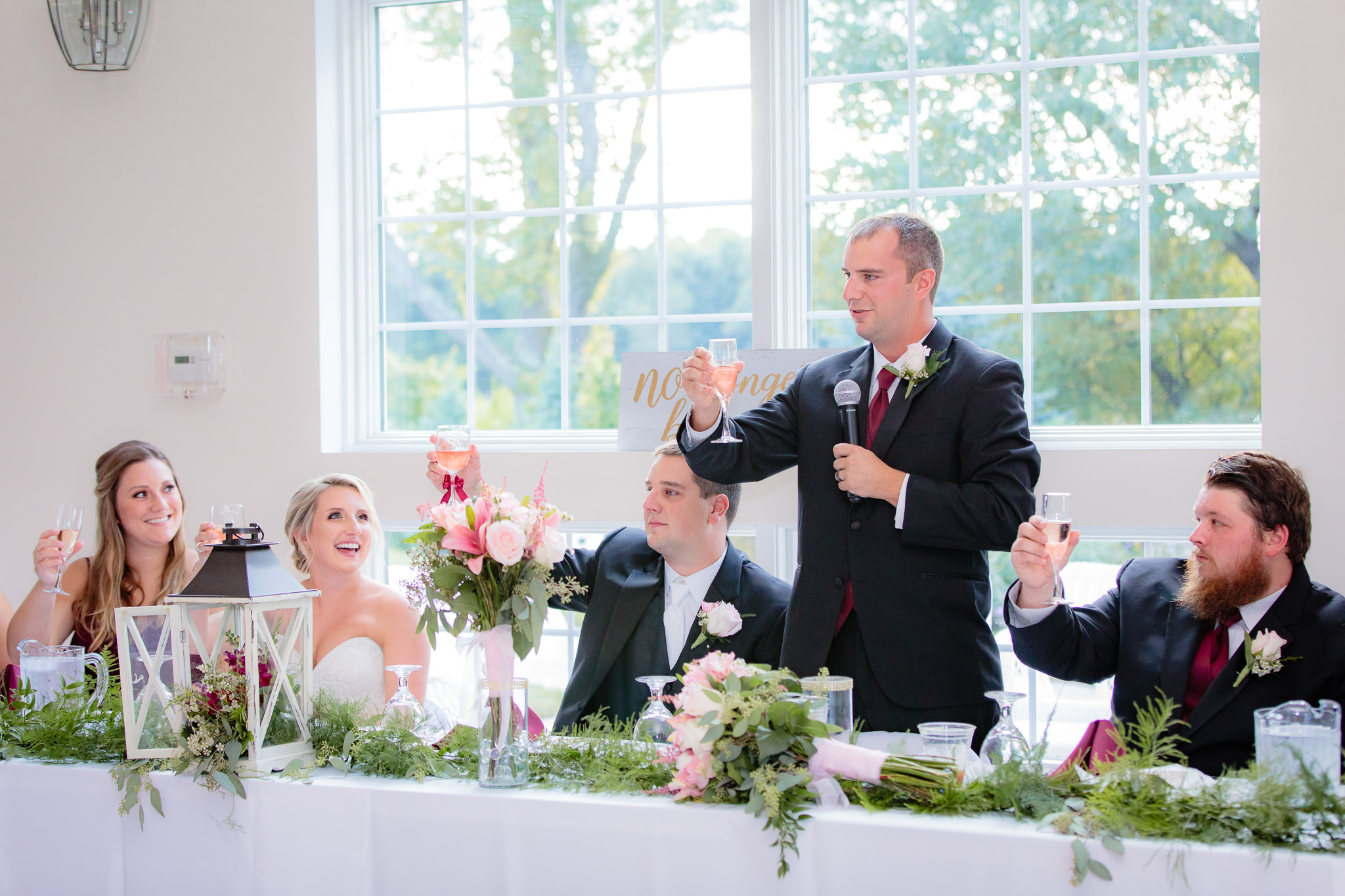 Best man toasts the bride & groom at a Greystone Fields wedding