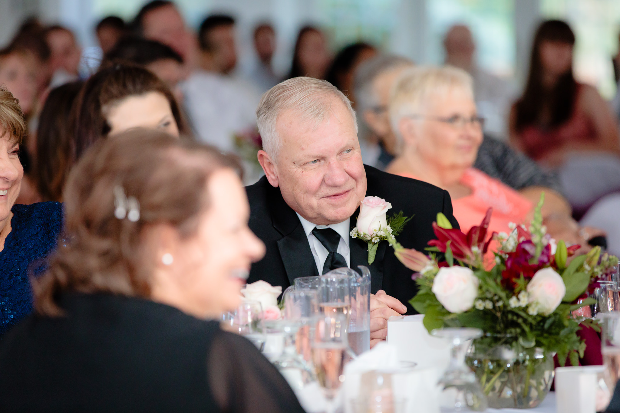 Father of the bride listens to speeches at a Greystone Fields wedding