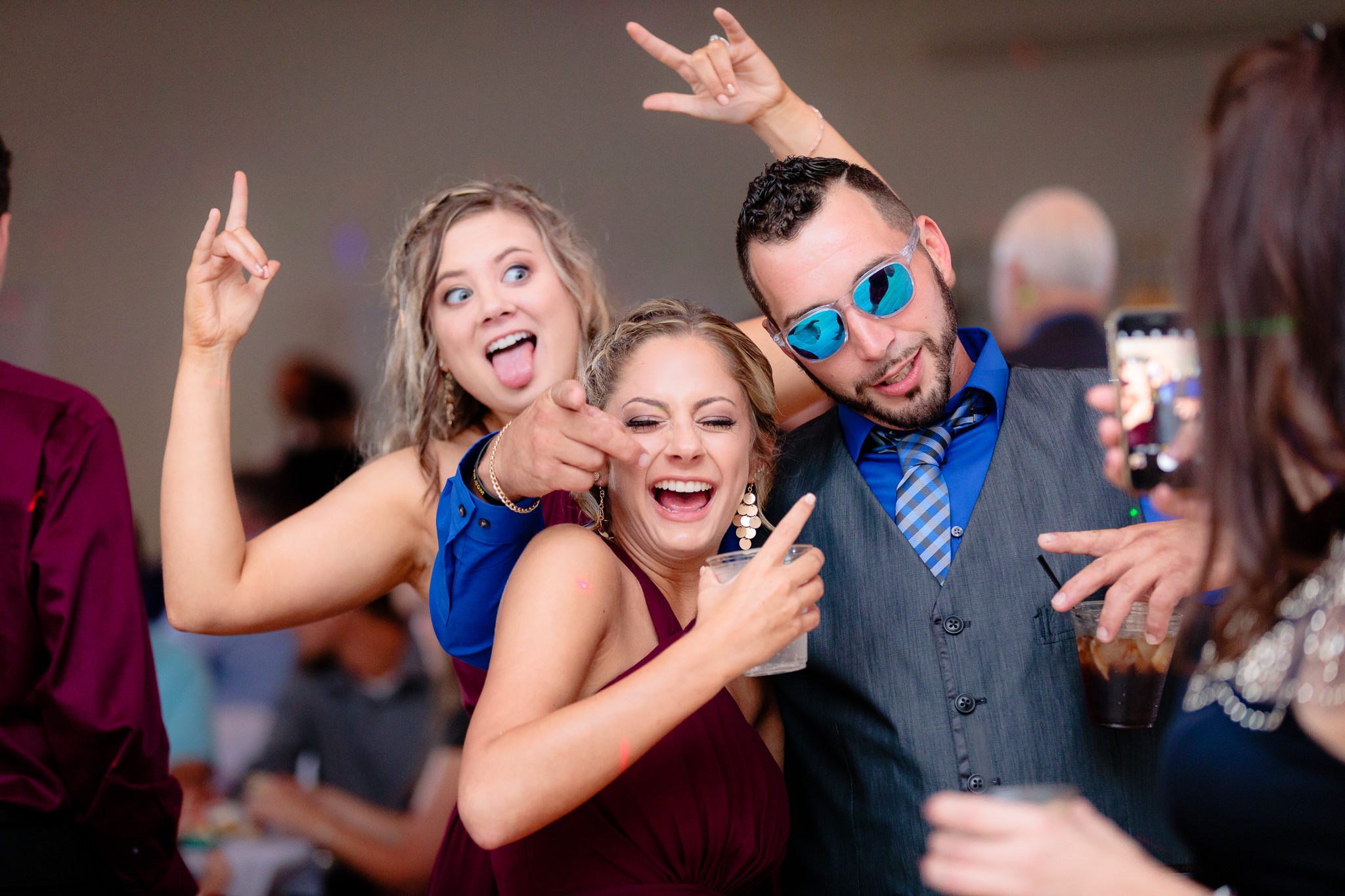 Guests take a selfie on the dance floor at a Greystone Fields wedding