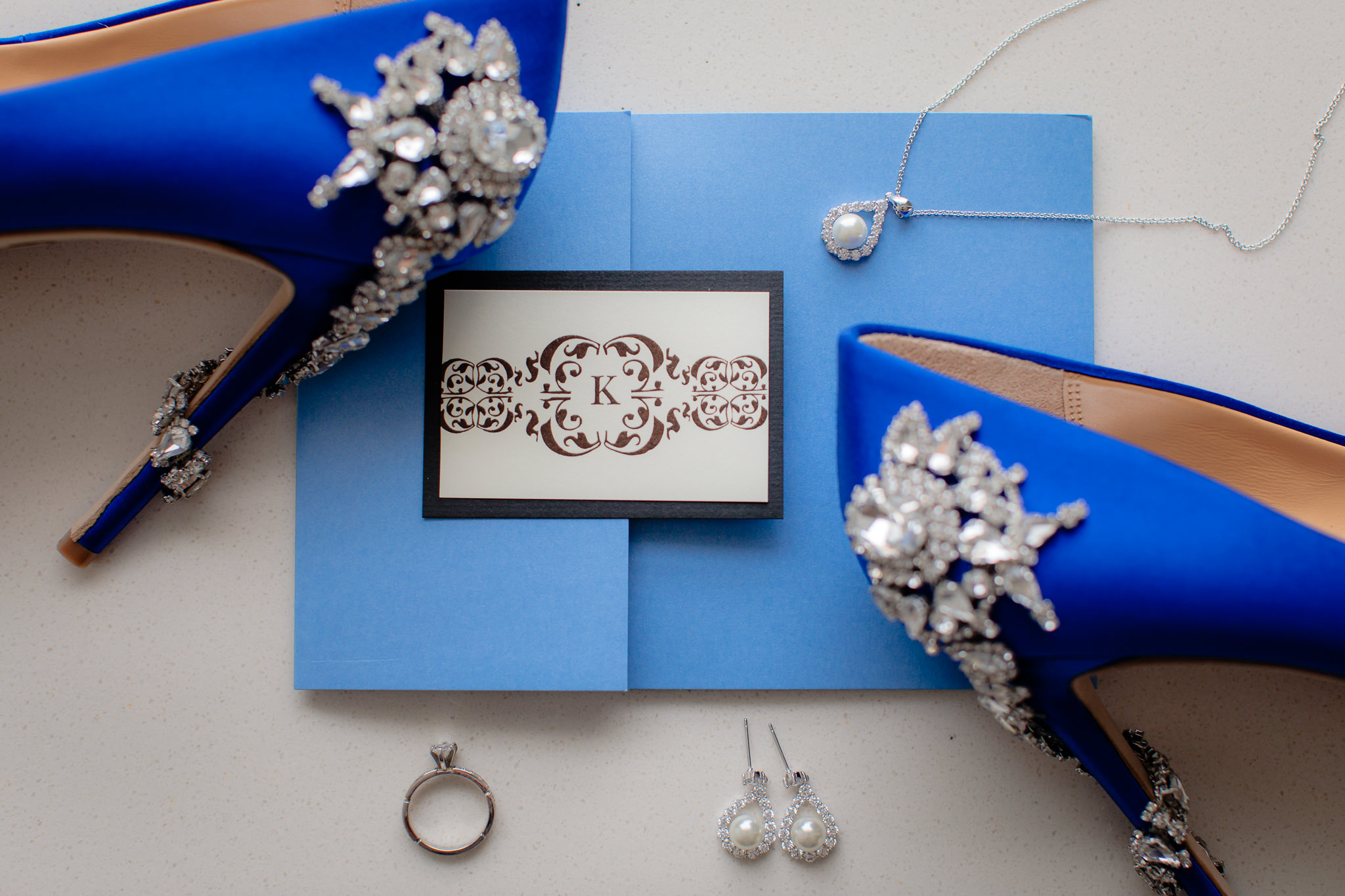 Blue invitation suite and blue wedding shoes with pearl & diamond bridal jewelry