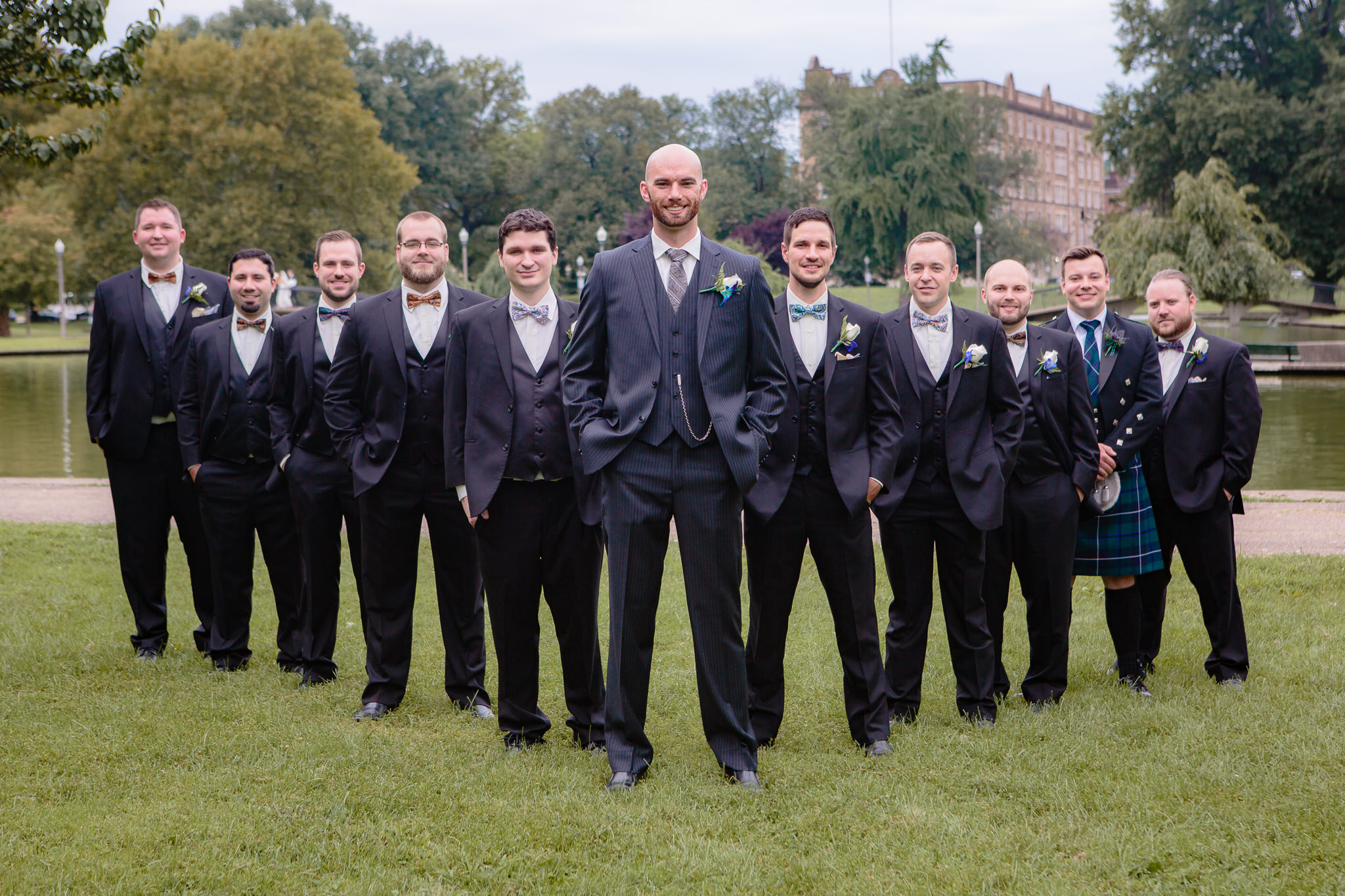 Groom and groomsmen in Allegheny Commons Park in Pittsburgh, PA