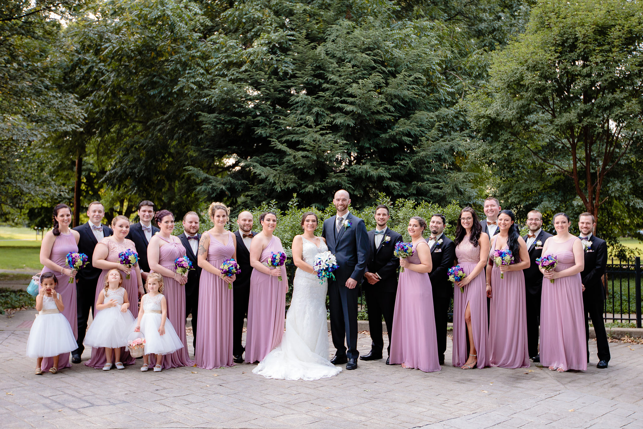 Bridal party poses at a National Aviary wedding
