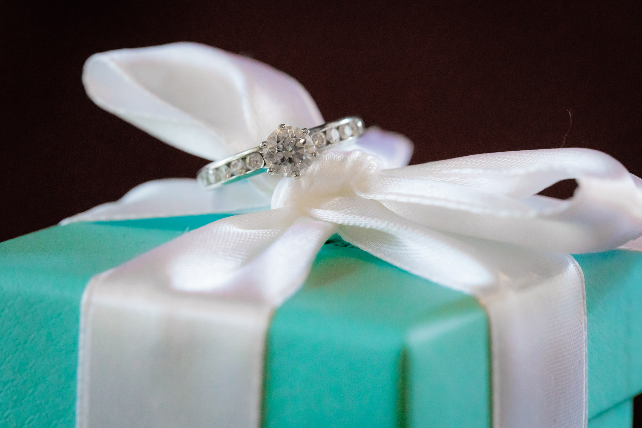 Tiffany engagement ring rests on top of a Tiffany blue gift box at Oglebay