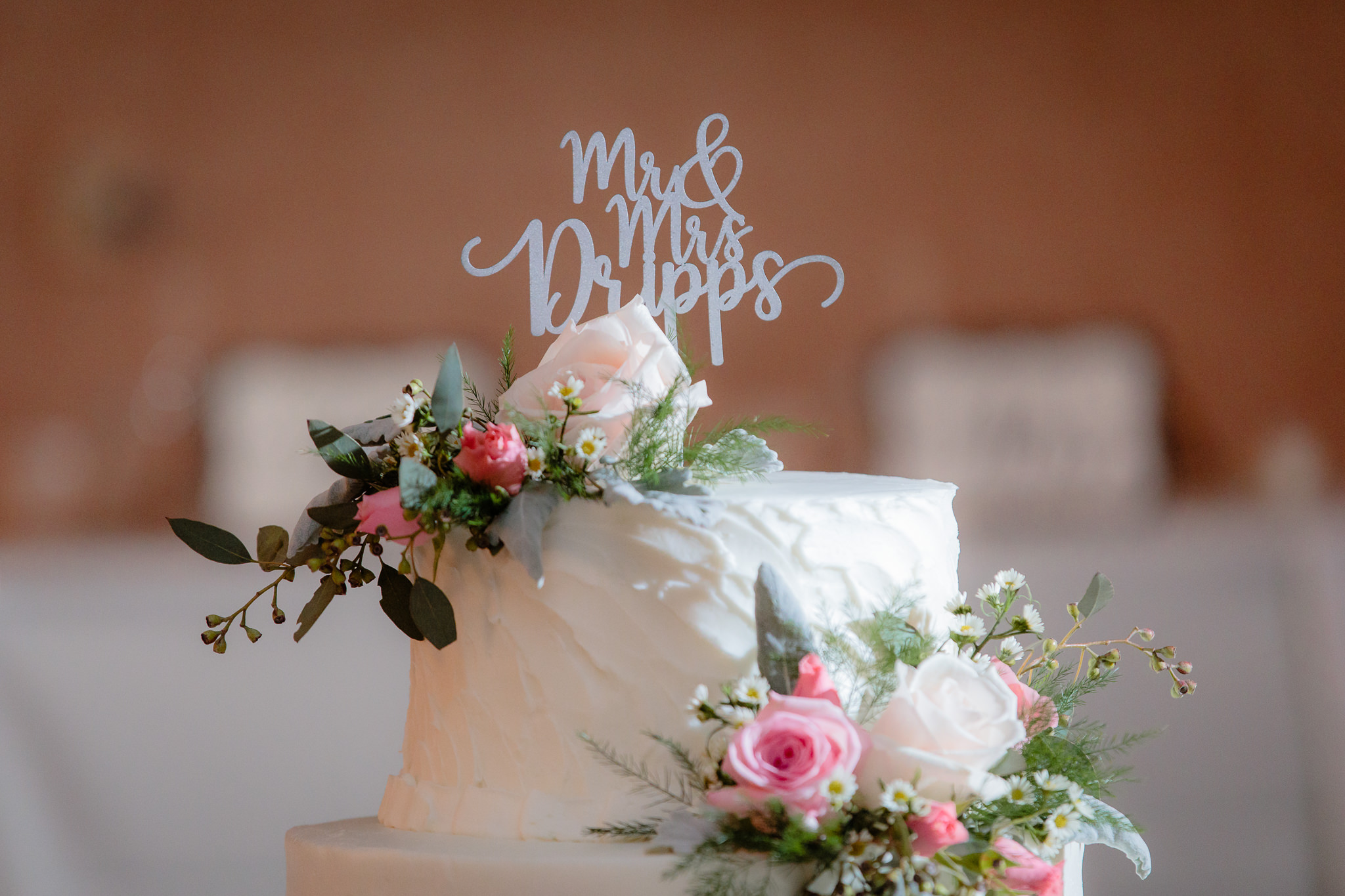 Mr. & Mrs. cake topper on a wedding cake at Oglebay