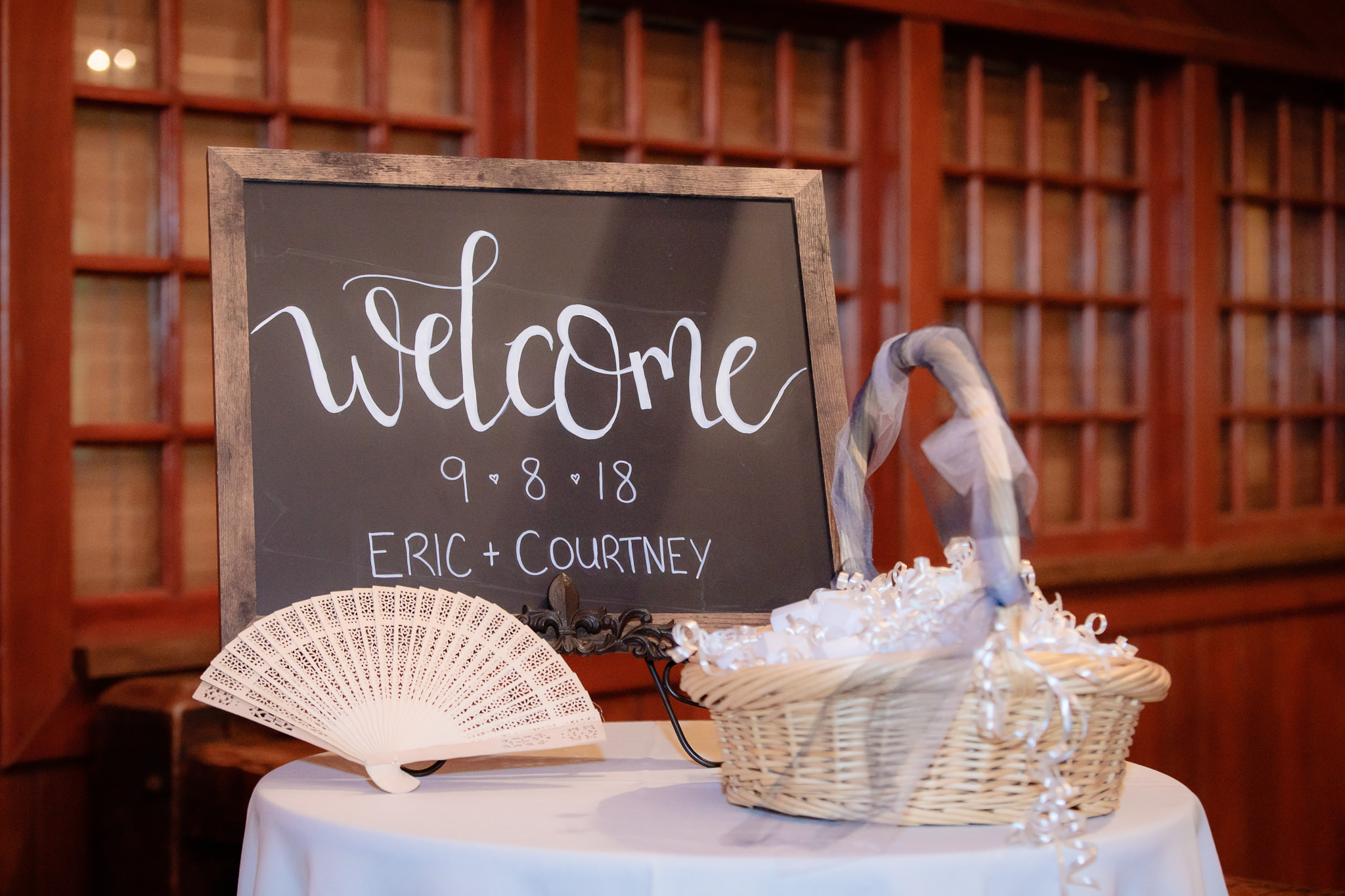 Chalkboard welcome sign at an Oglebay wedding ceremony