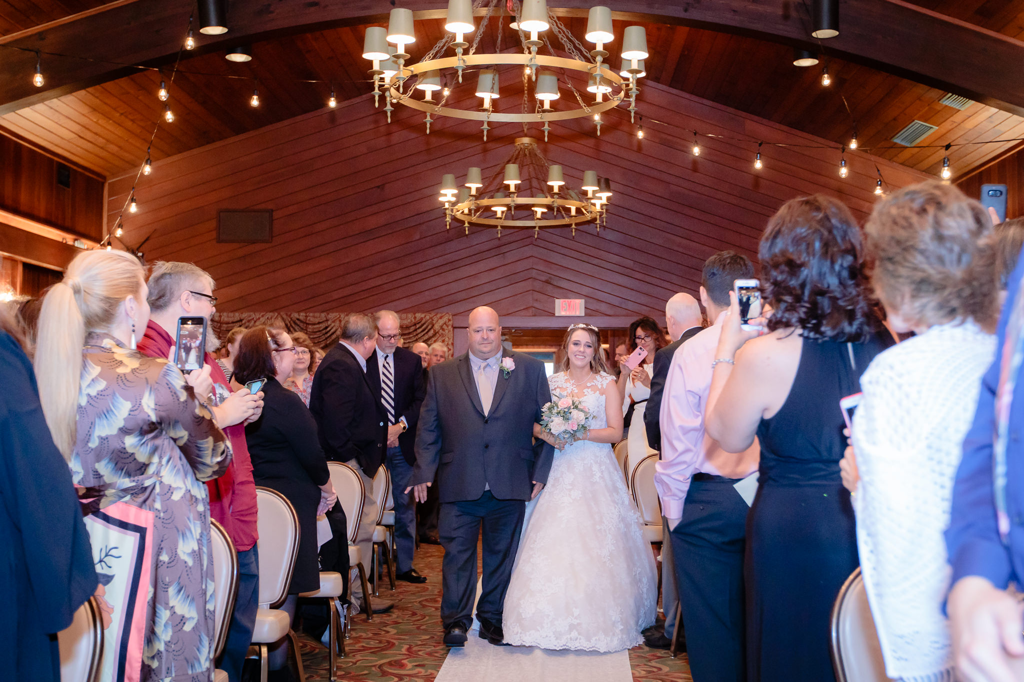 Father of the bride walks his daughter down the aisle at Oglebay