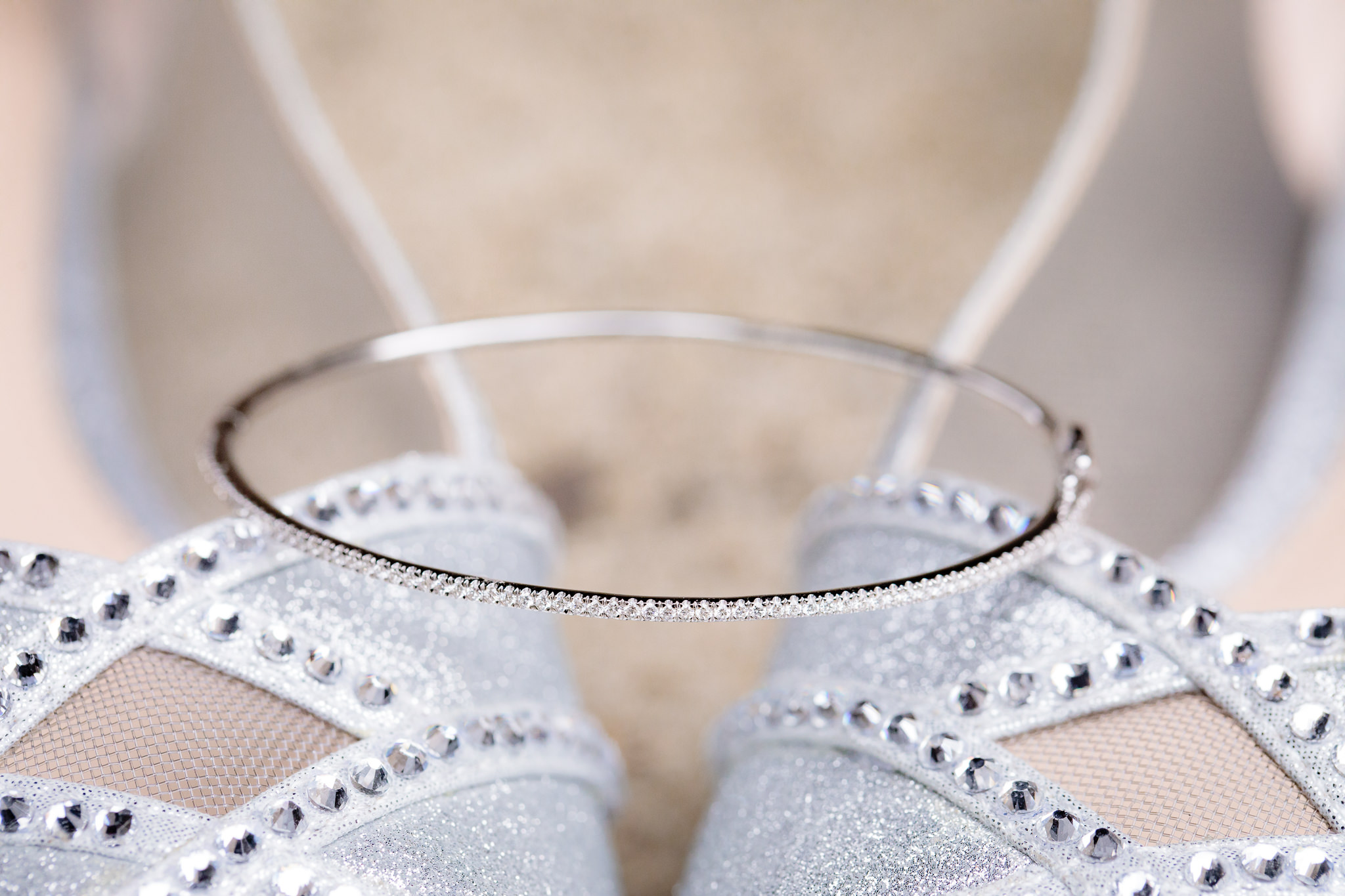 The bride's silver diamond bracelet and matching shoes for a Pennsylvanian wedding