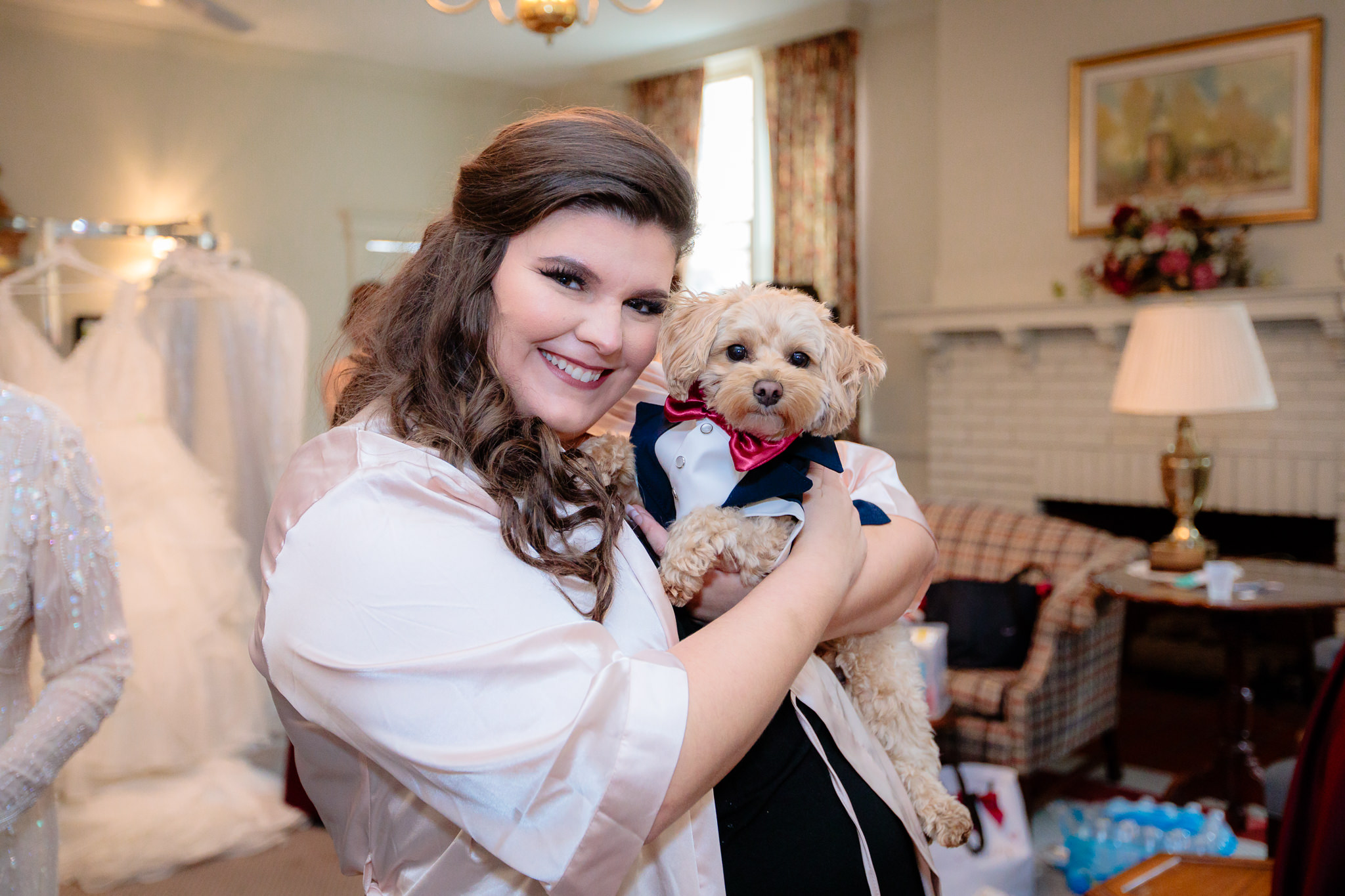 The bride and her dog while getting ready for her wedding at the Pennsylvanian