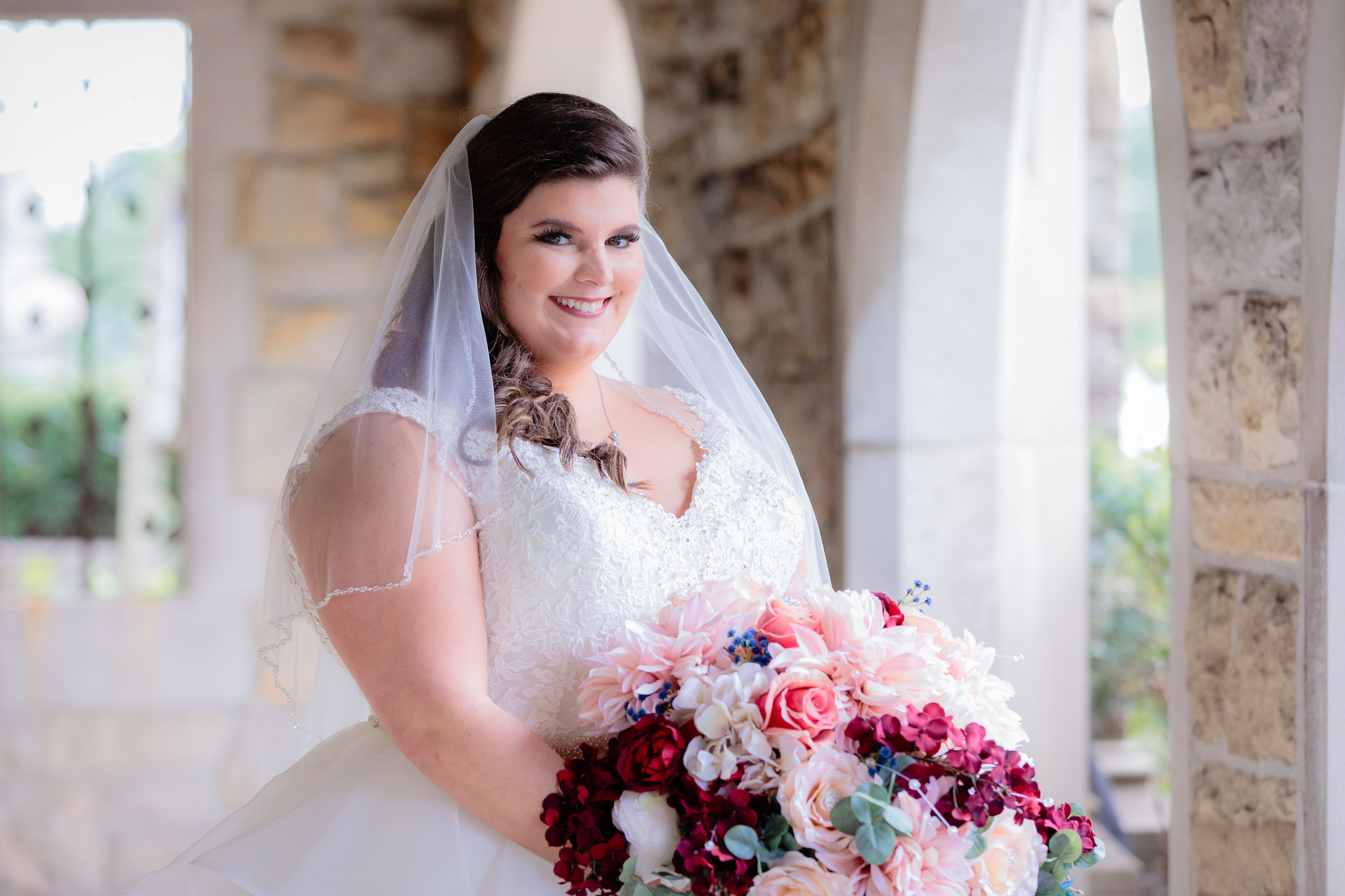 The bride outside of Mt. Lebanon United Methodist Church with her DIY artificial flowers