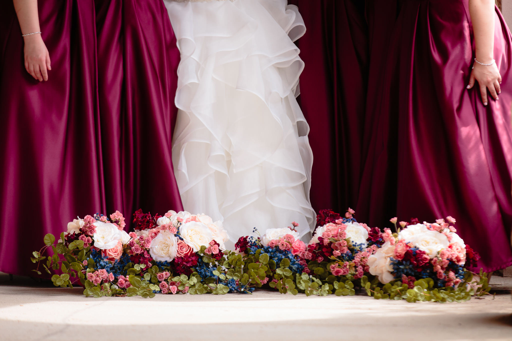 The bridal party's dresses along with their DIY flower bouquets at Mt. Lebanon United Methodist Church