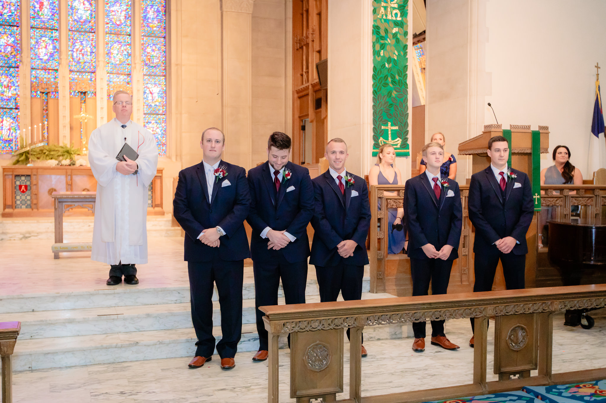 The groom and groomsmen at the front of Mt. Lebanon United Methodist Church