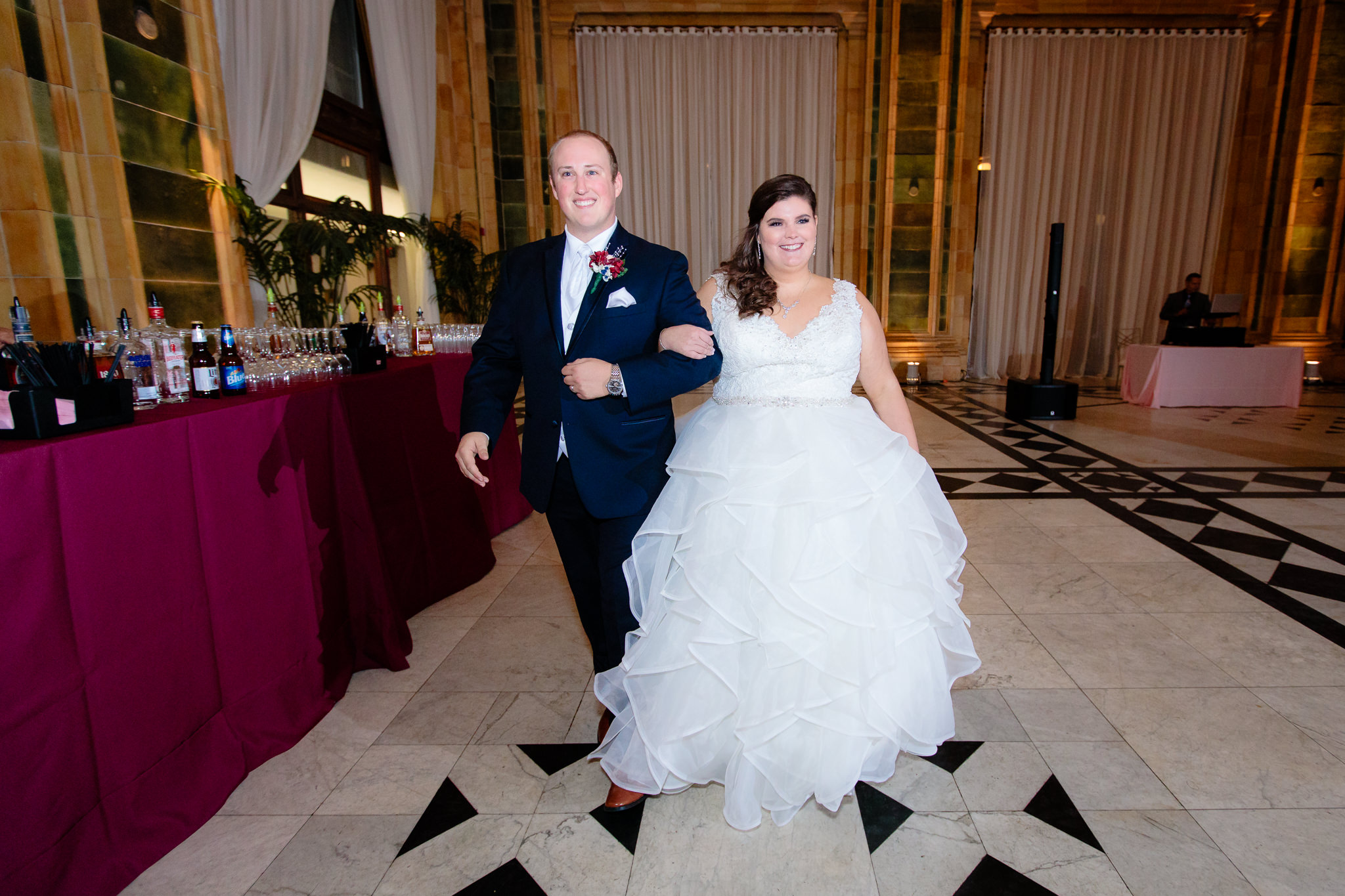 Bride and groom entering their reception at The Pennsylvanian