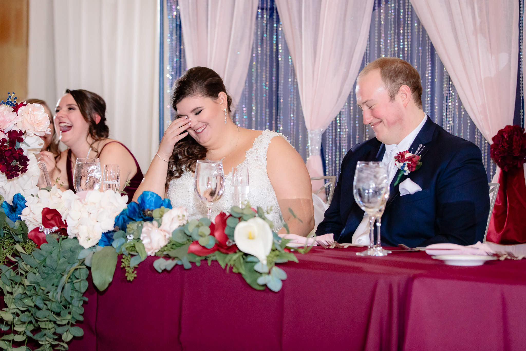Bride and groom share a laugh at their reception at the Pennsylvanian at the Pennsylvanian