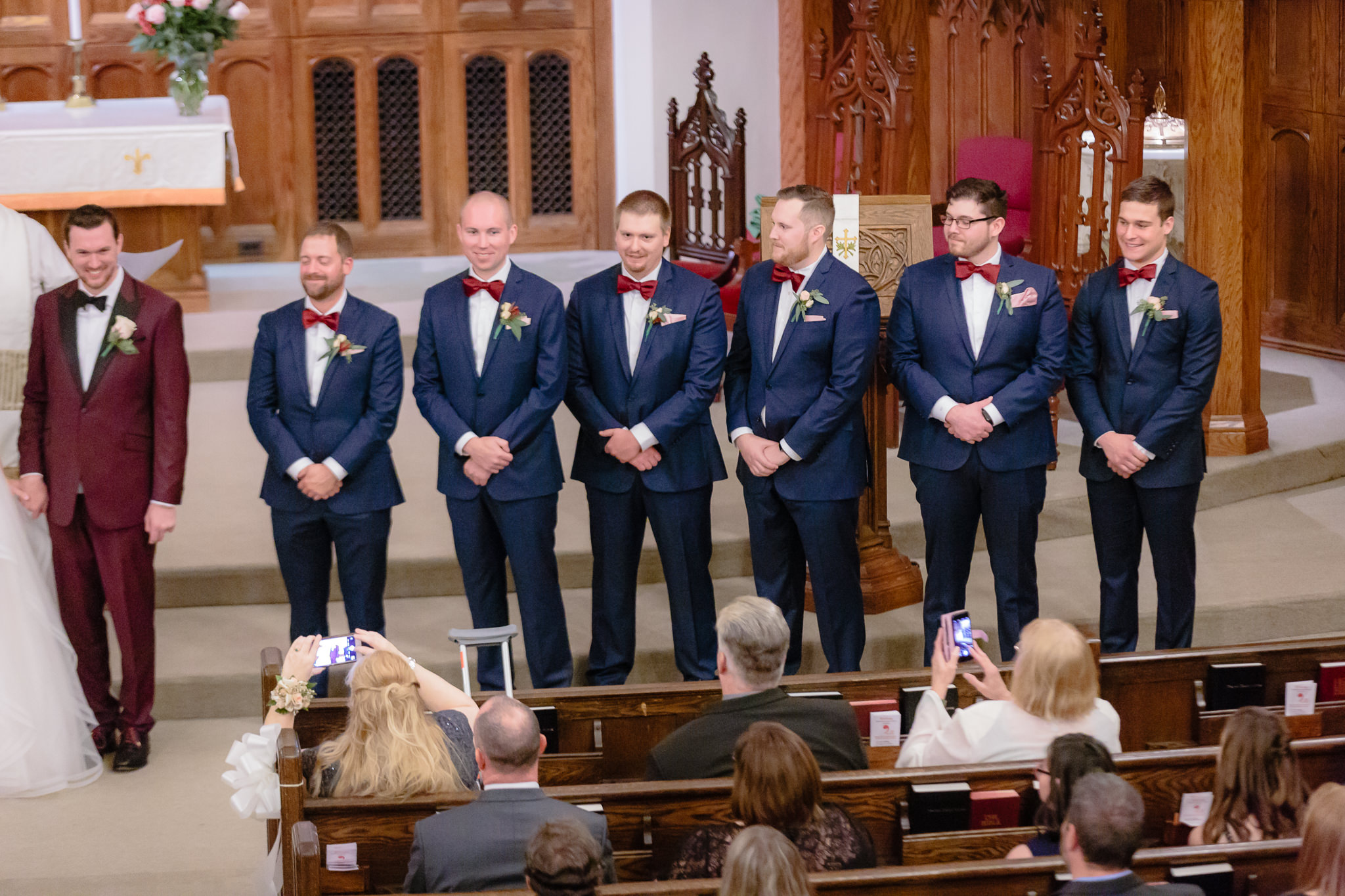 Groomsmen during a wedding ceremony at Smithfield United Church of Christ