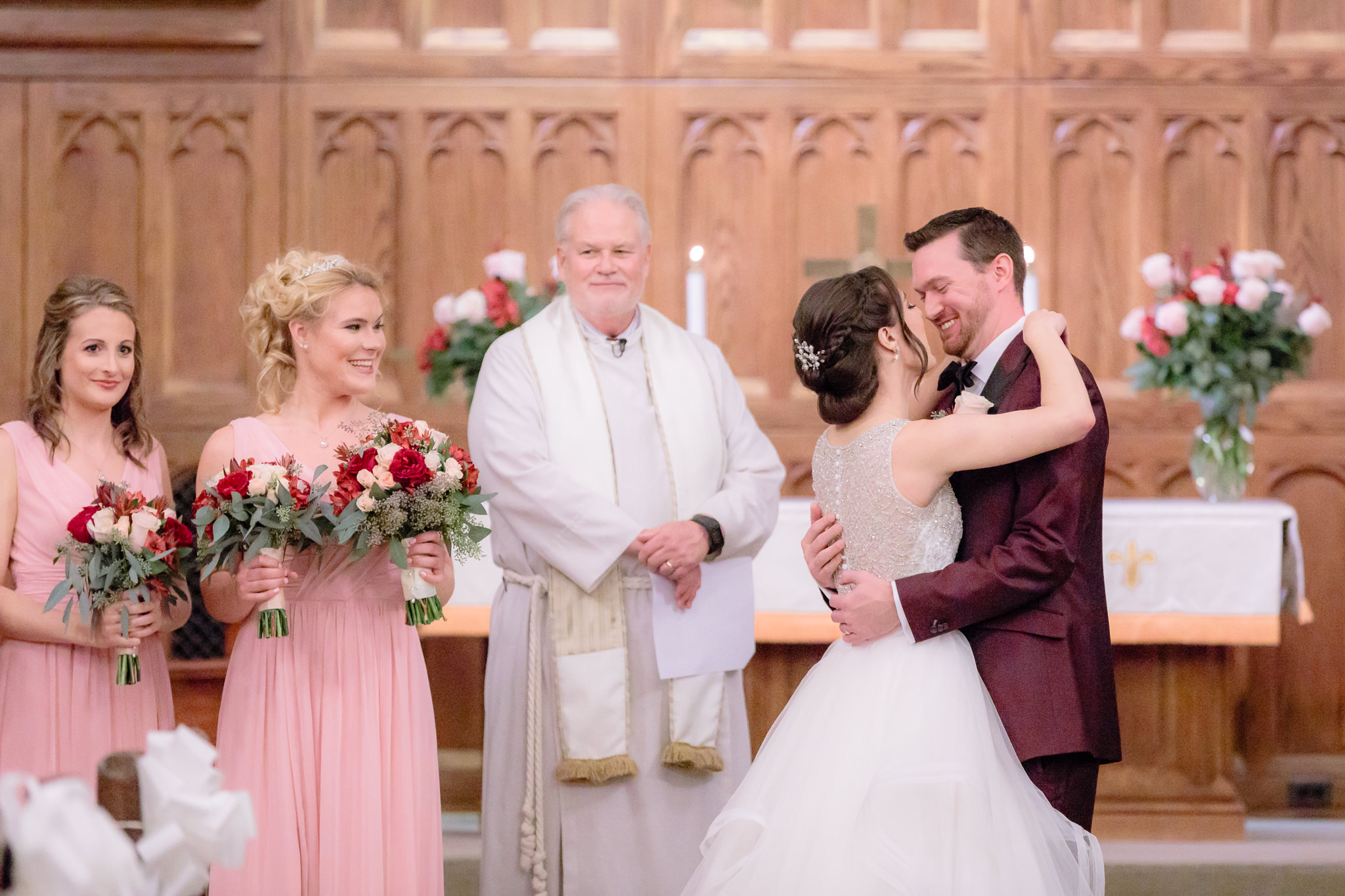 Just after the first kiss at a Smithfield United Church of Christ wedding
