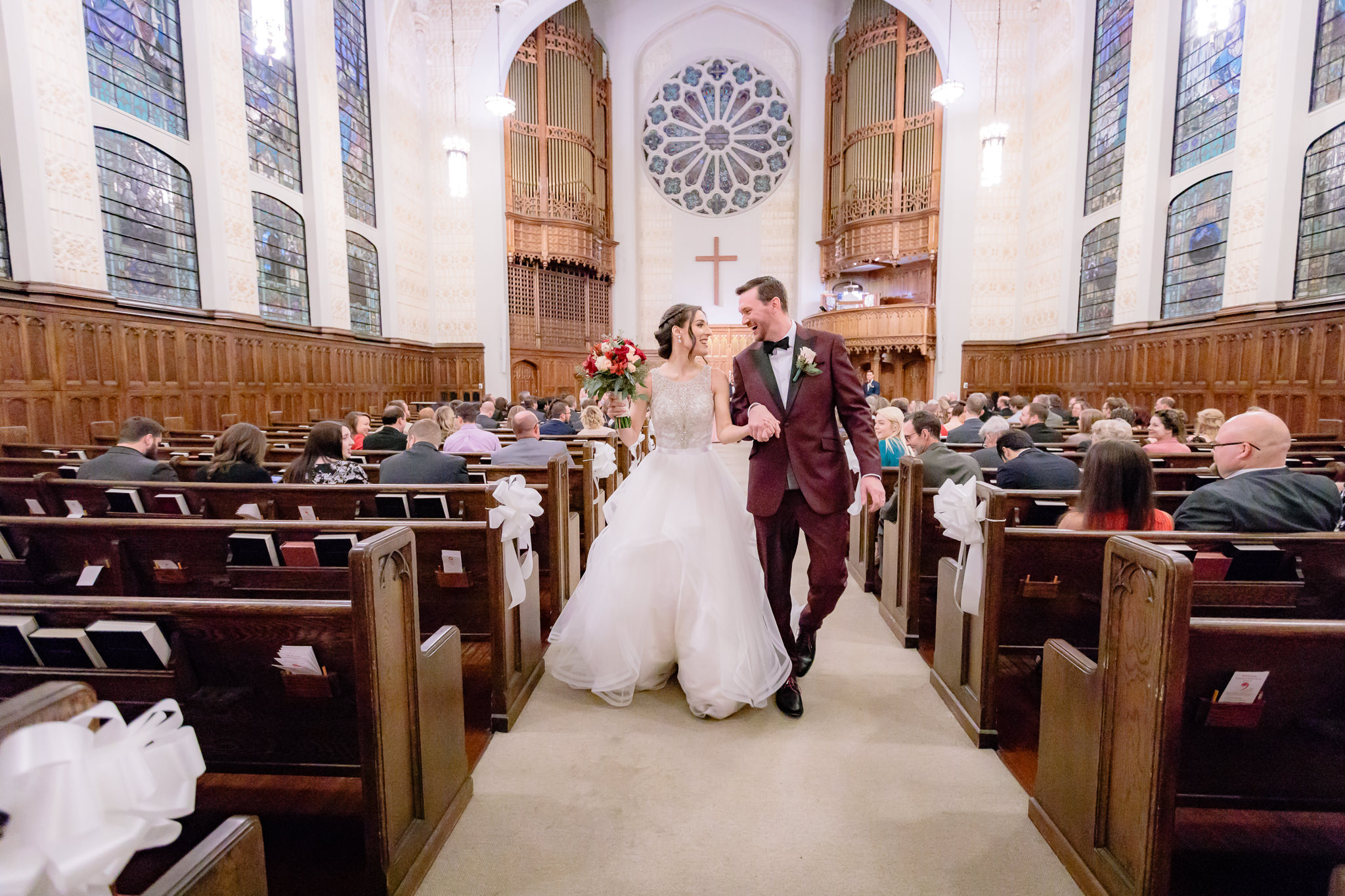 Newlyweds exit their wedding at the Smithfield United Church of Christ