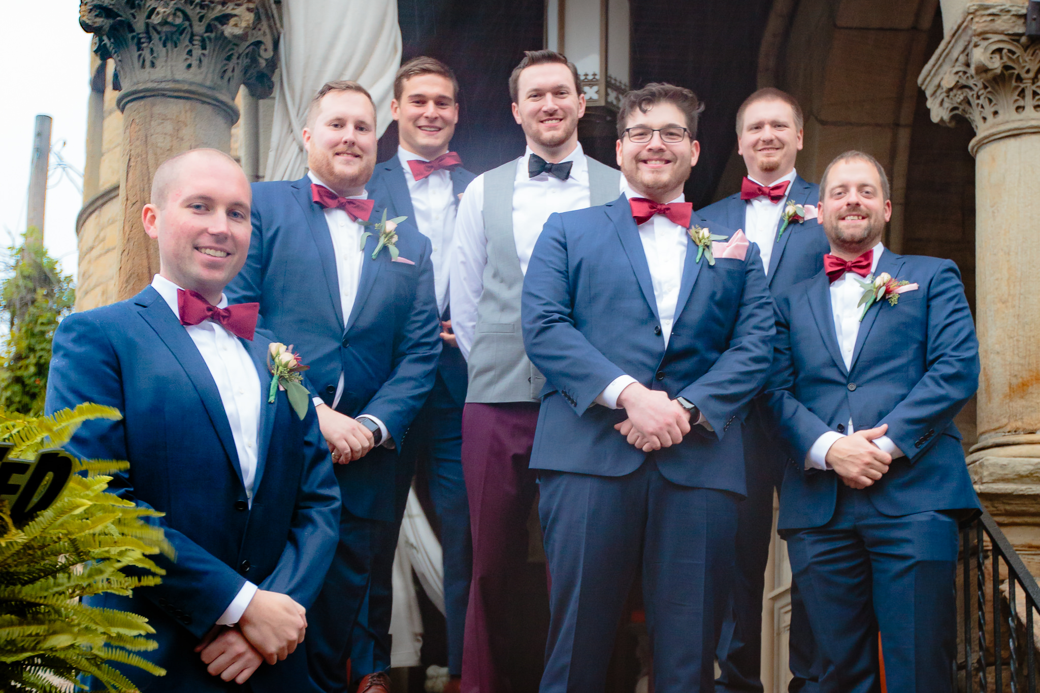 Groomsmen on the steps of a North Side house before a LeMont wedding