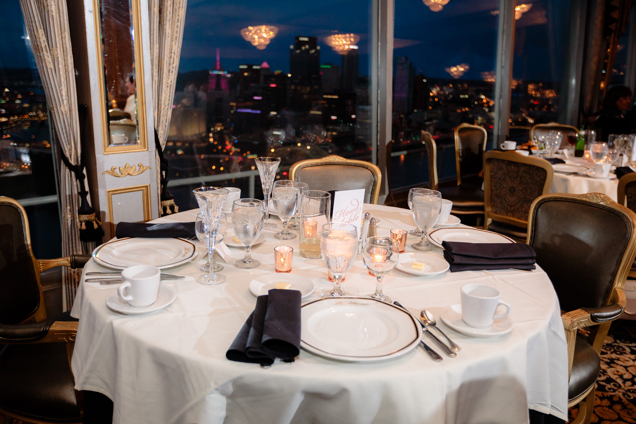 Head table overlooking the city at a LeMont wedding