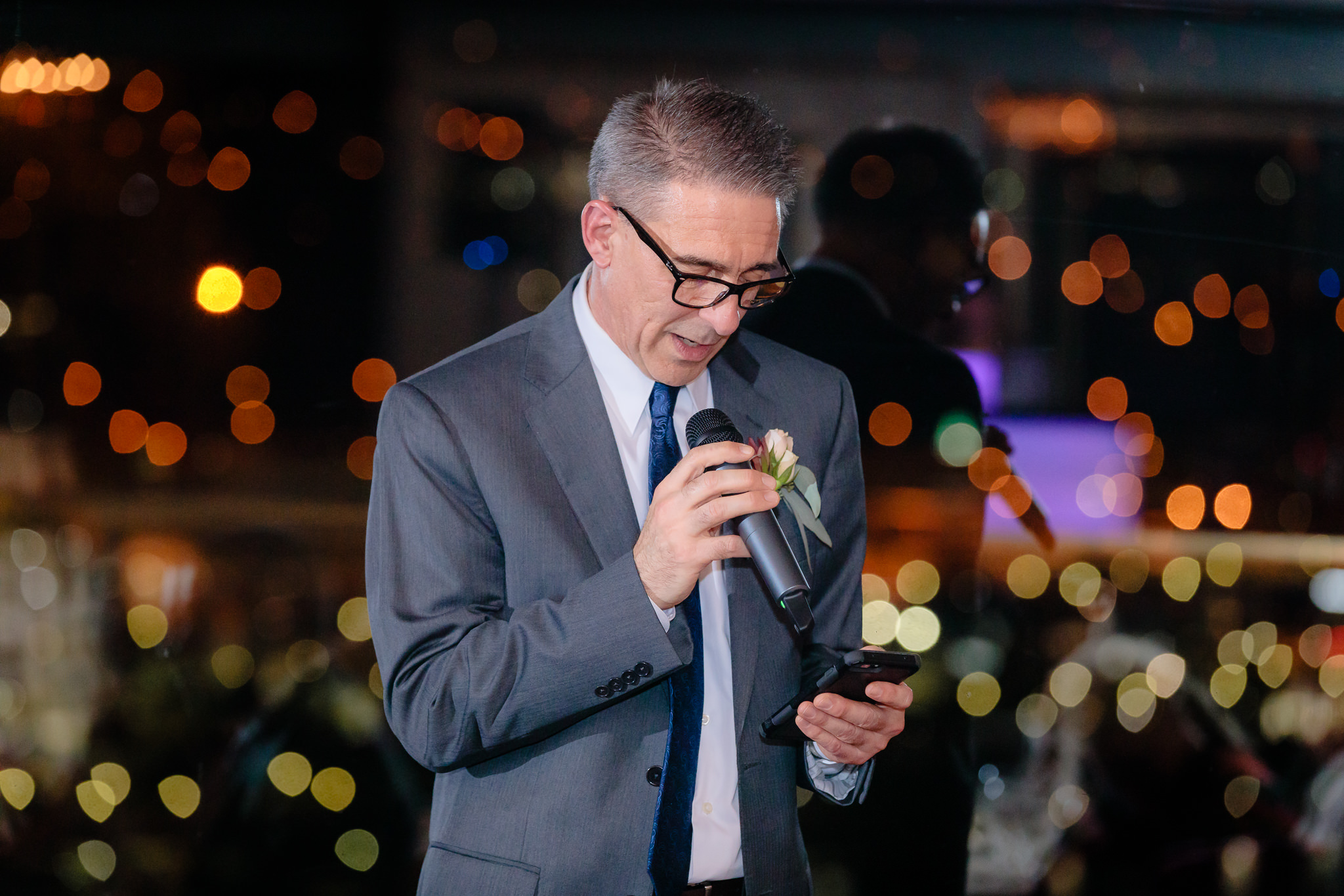 Father of the bride speaks at a LeMont wedding