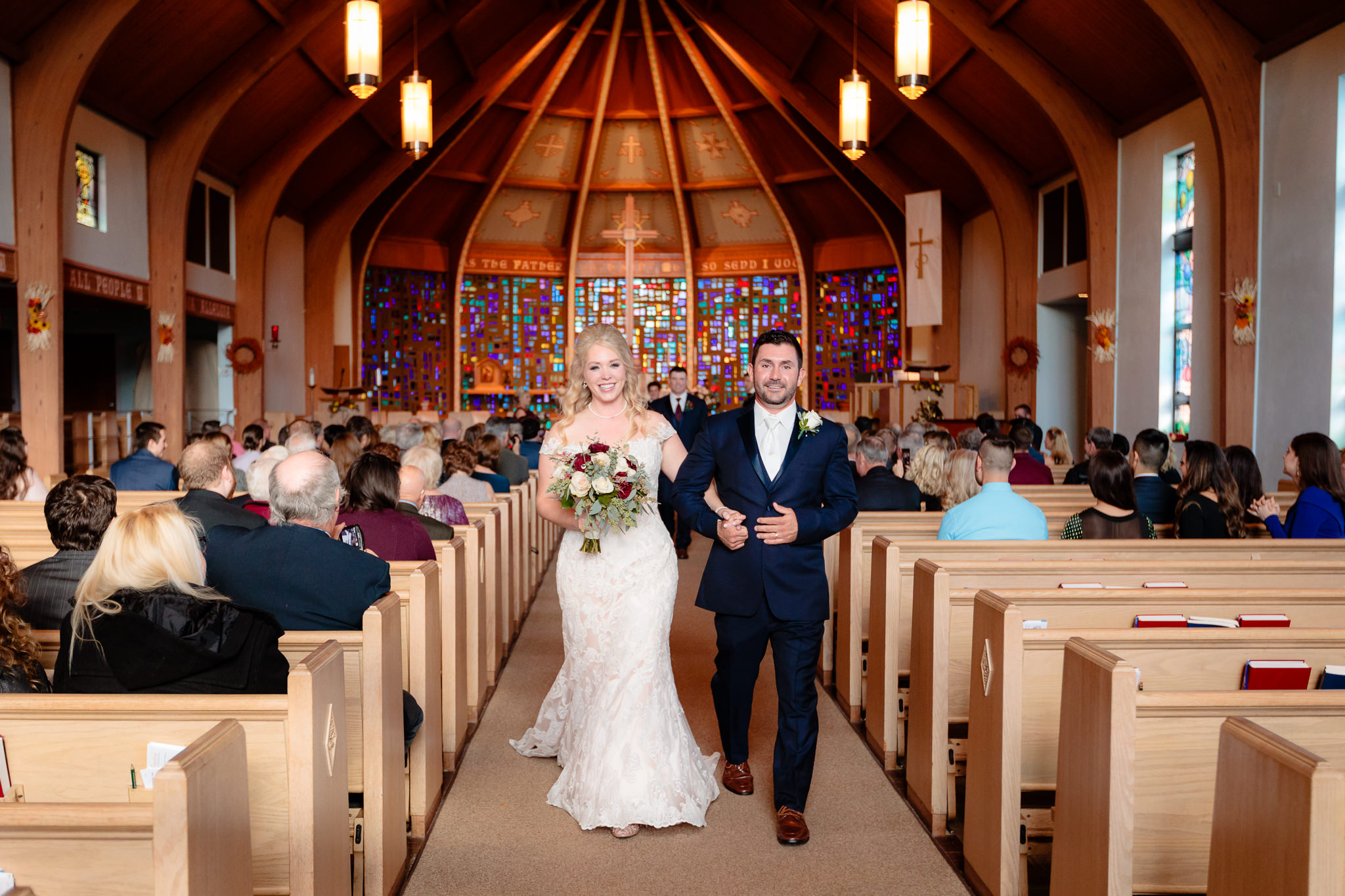 Newlyweds exit their wedding at Zion Lutheran Church in Penn Hills