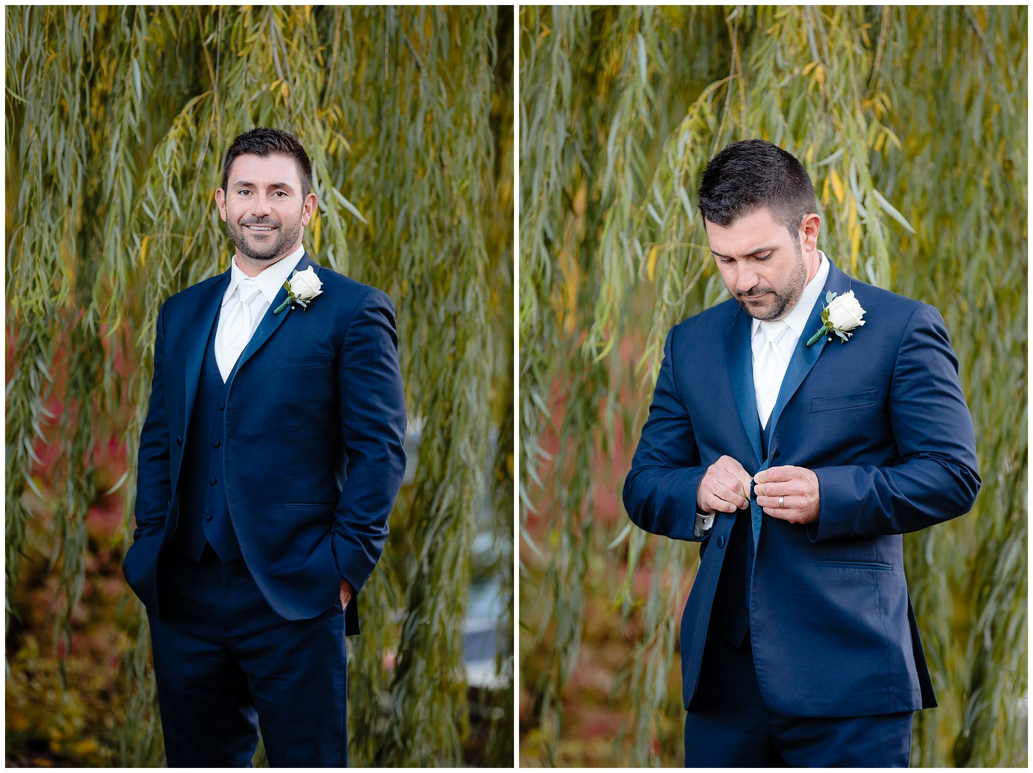 Groom in a navy tux from Jack's Tuxedo at his Riverside Landing wedding