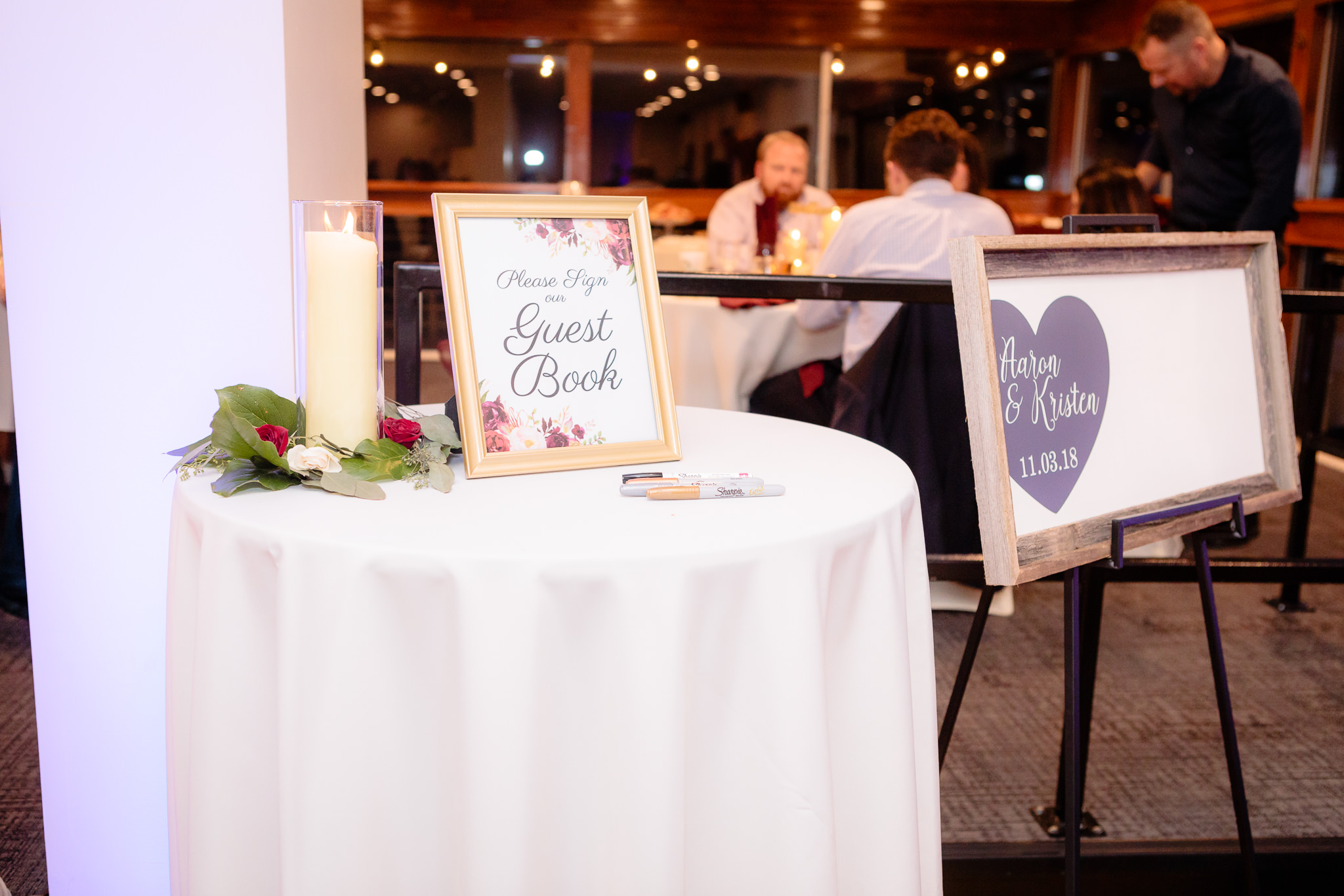 Guestbook sign-in board at a Riverside Landing wedding