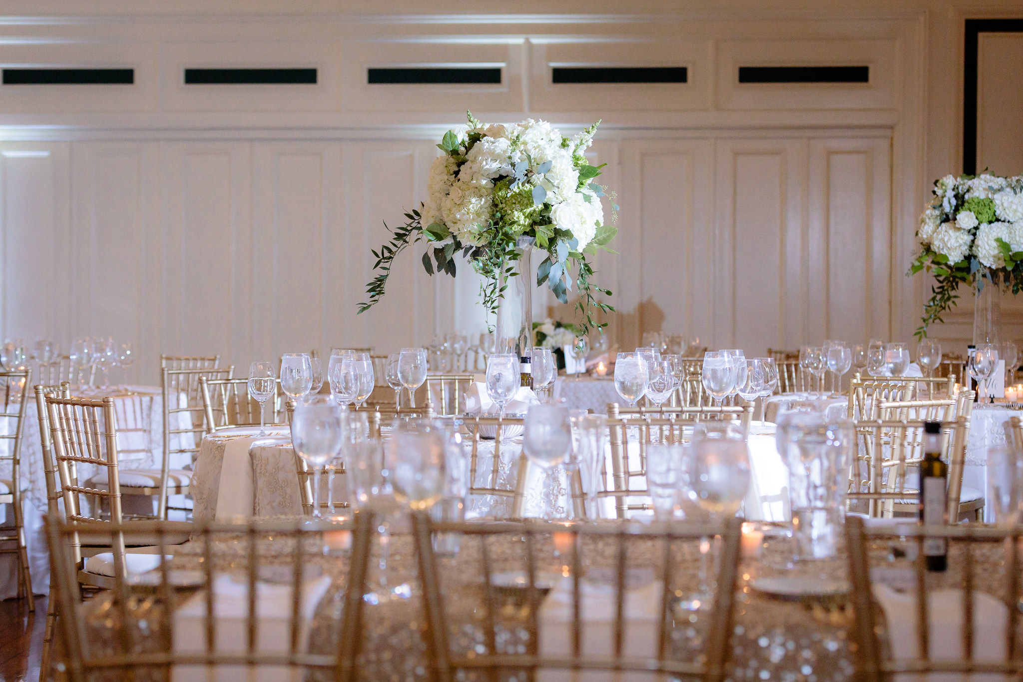 Tall white hydrangea centerpieces at a Soldiers & Sailors wedding reception