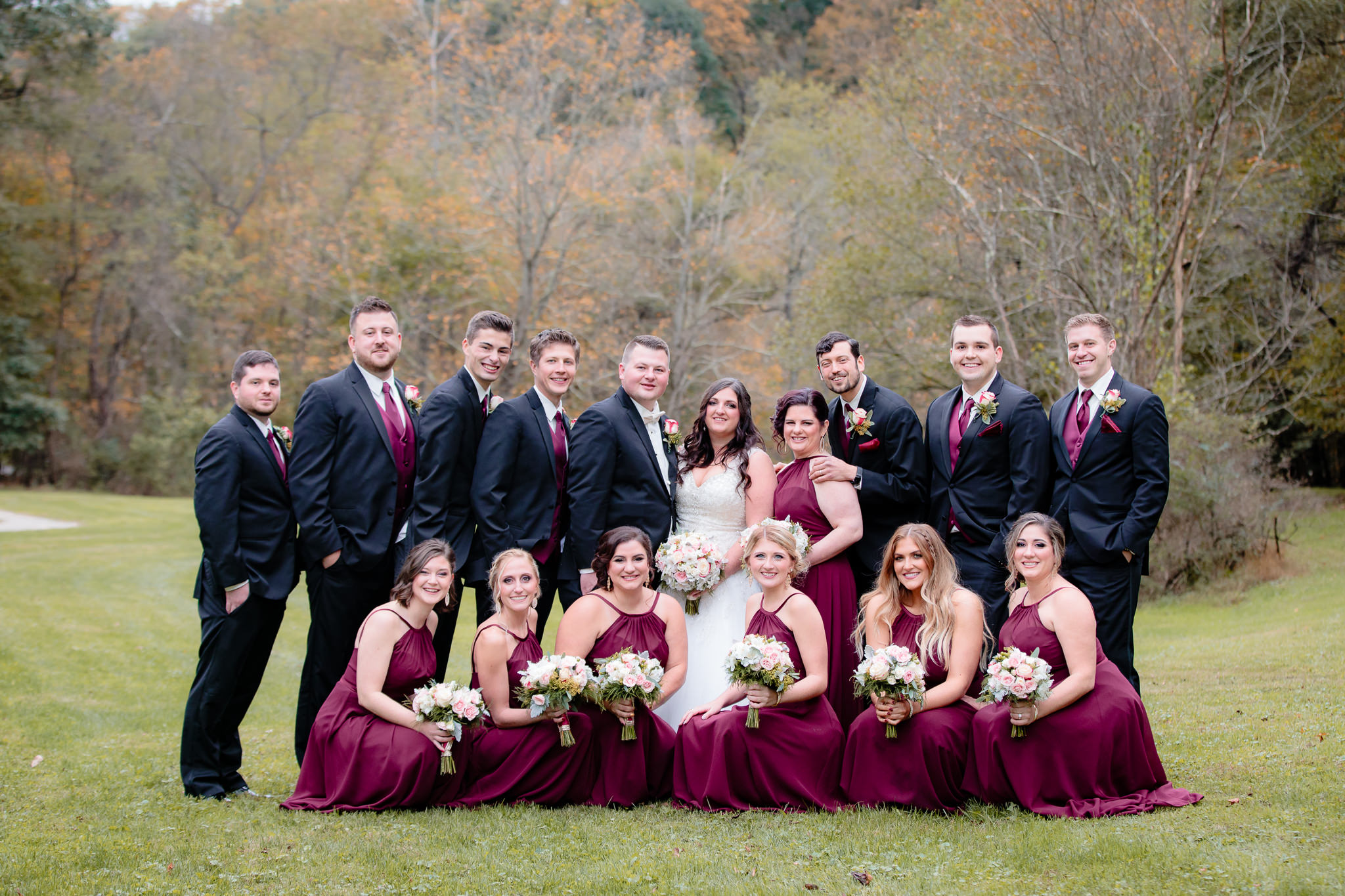 Bridal party poses in a park before a Fez wedding