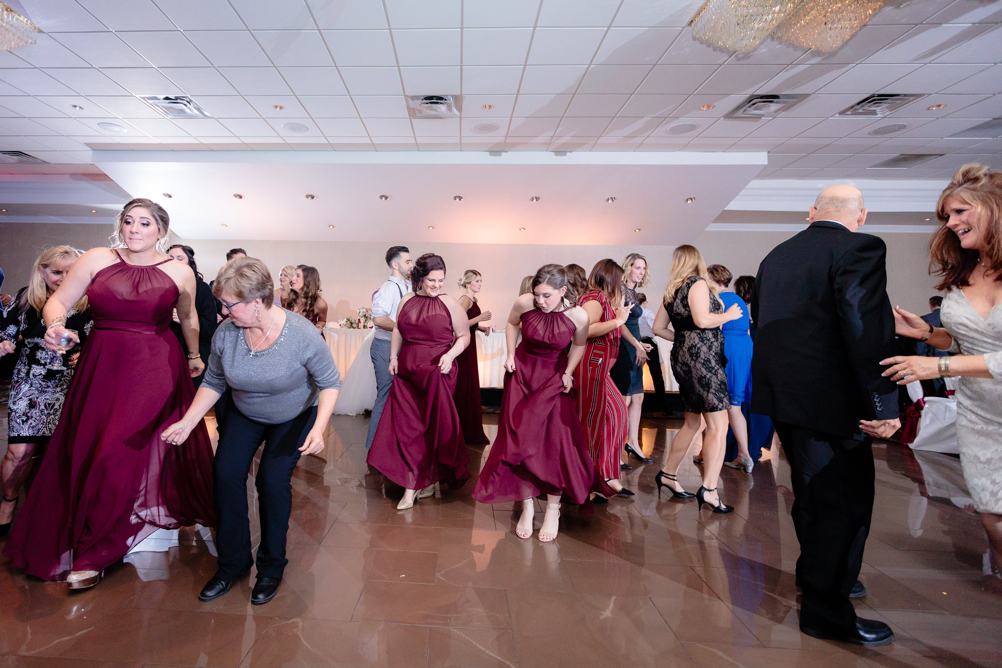 Wedding guests fill the dance floor at the Fez