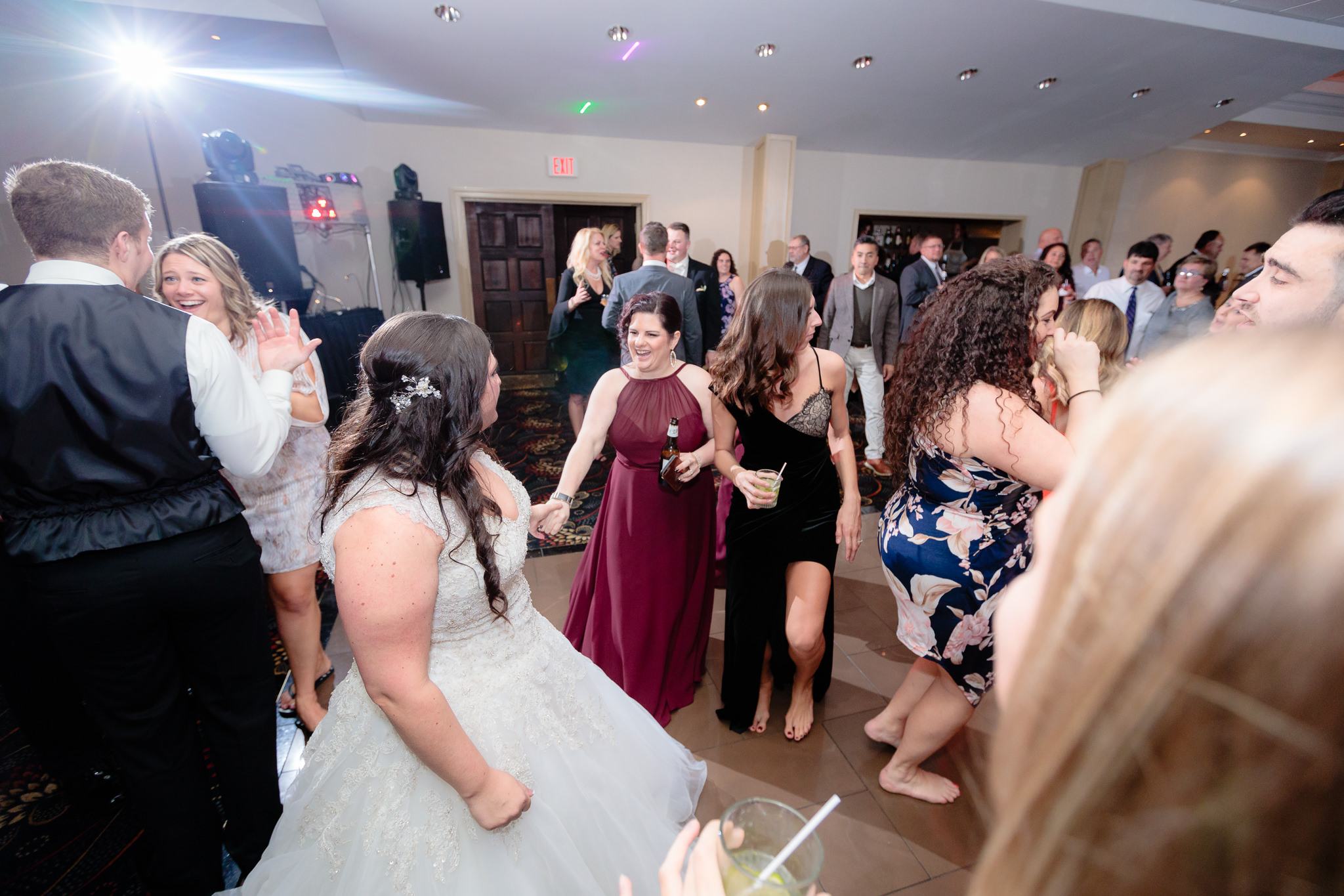 Bride dances with her sister at her reception at the Fez