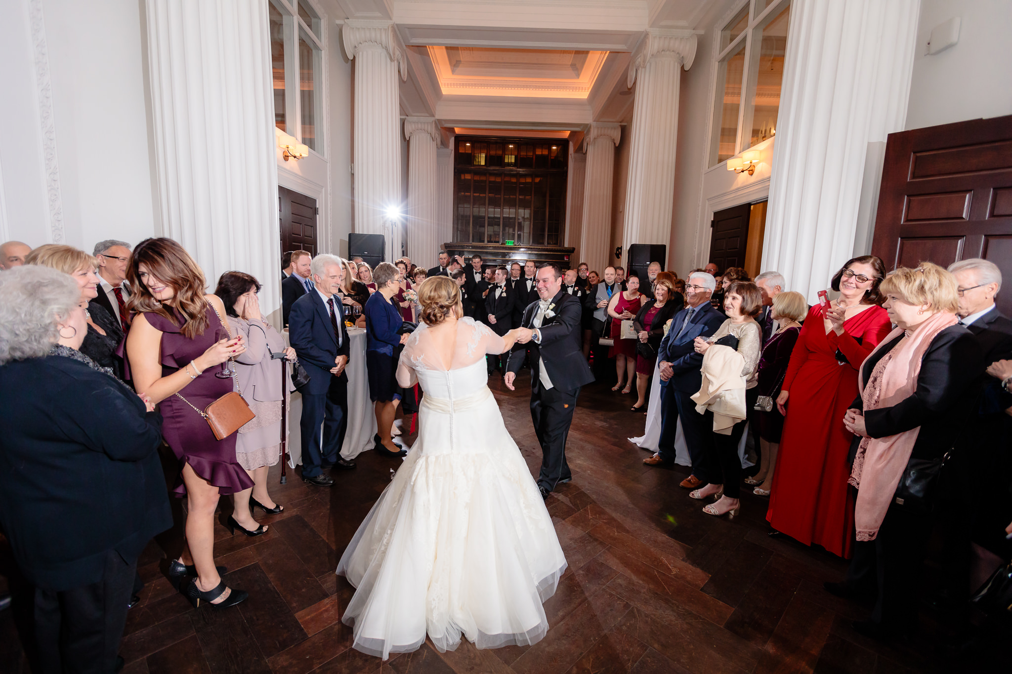 Guests line the dance floor during the first dance at Hotel Monaco