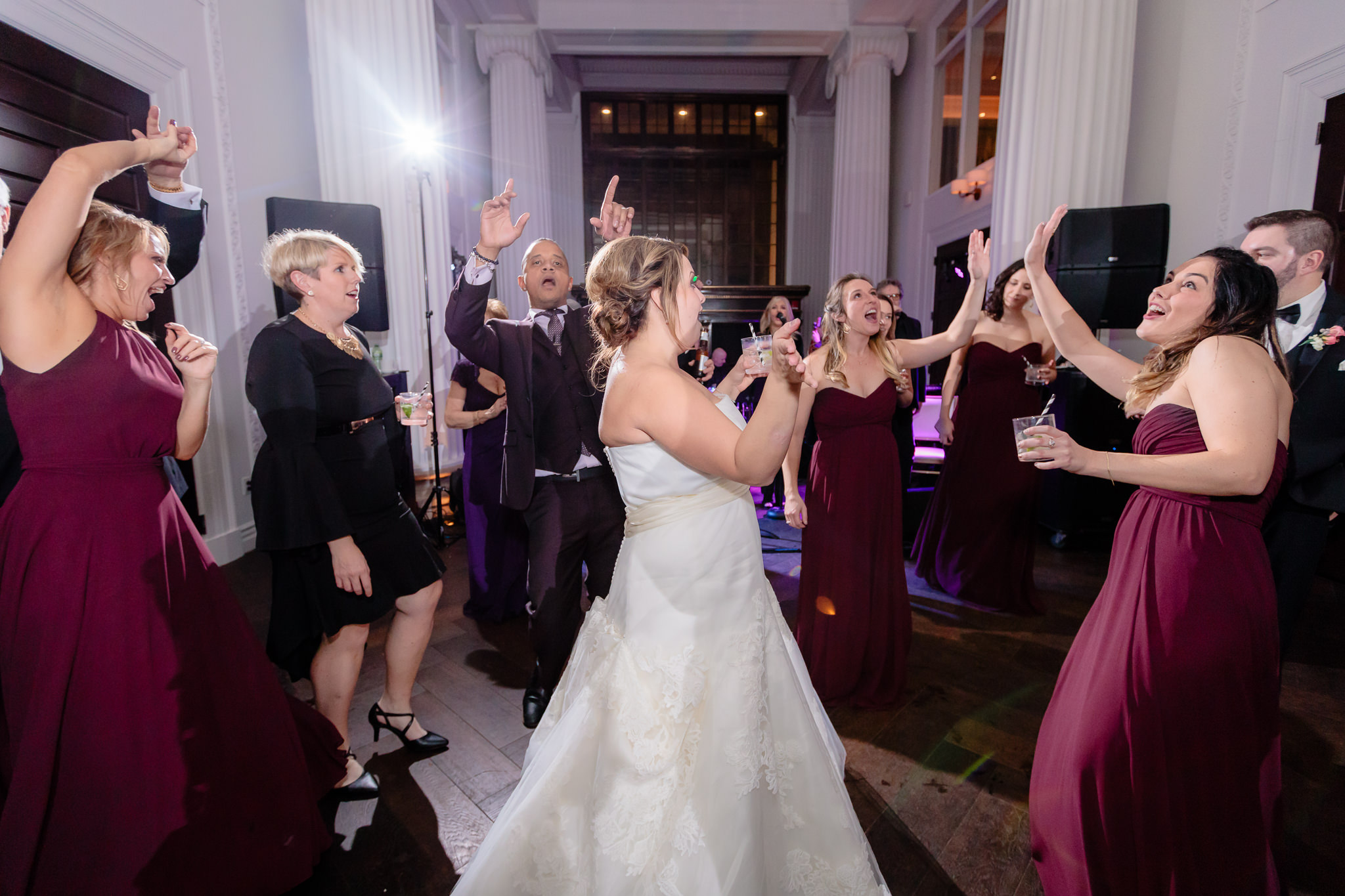 Bride dances with guests at her Hotel Monaco wedding in Pittsburgh