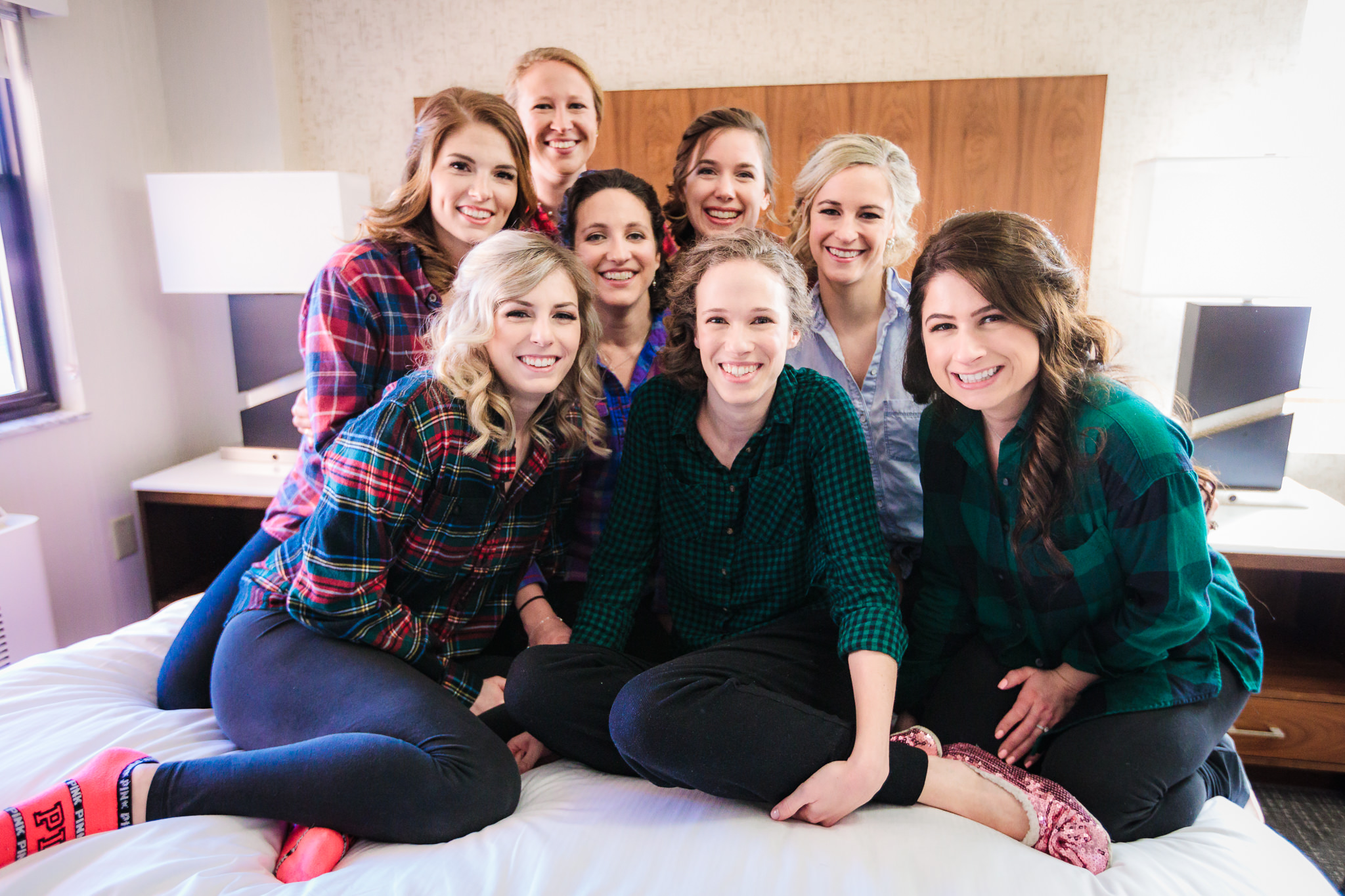 Bride and her bridesmaids wearing flannel shirts before a February wedding at Heinz Chapel in Pittsburgh, PA
