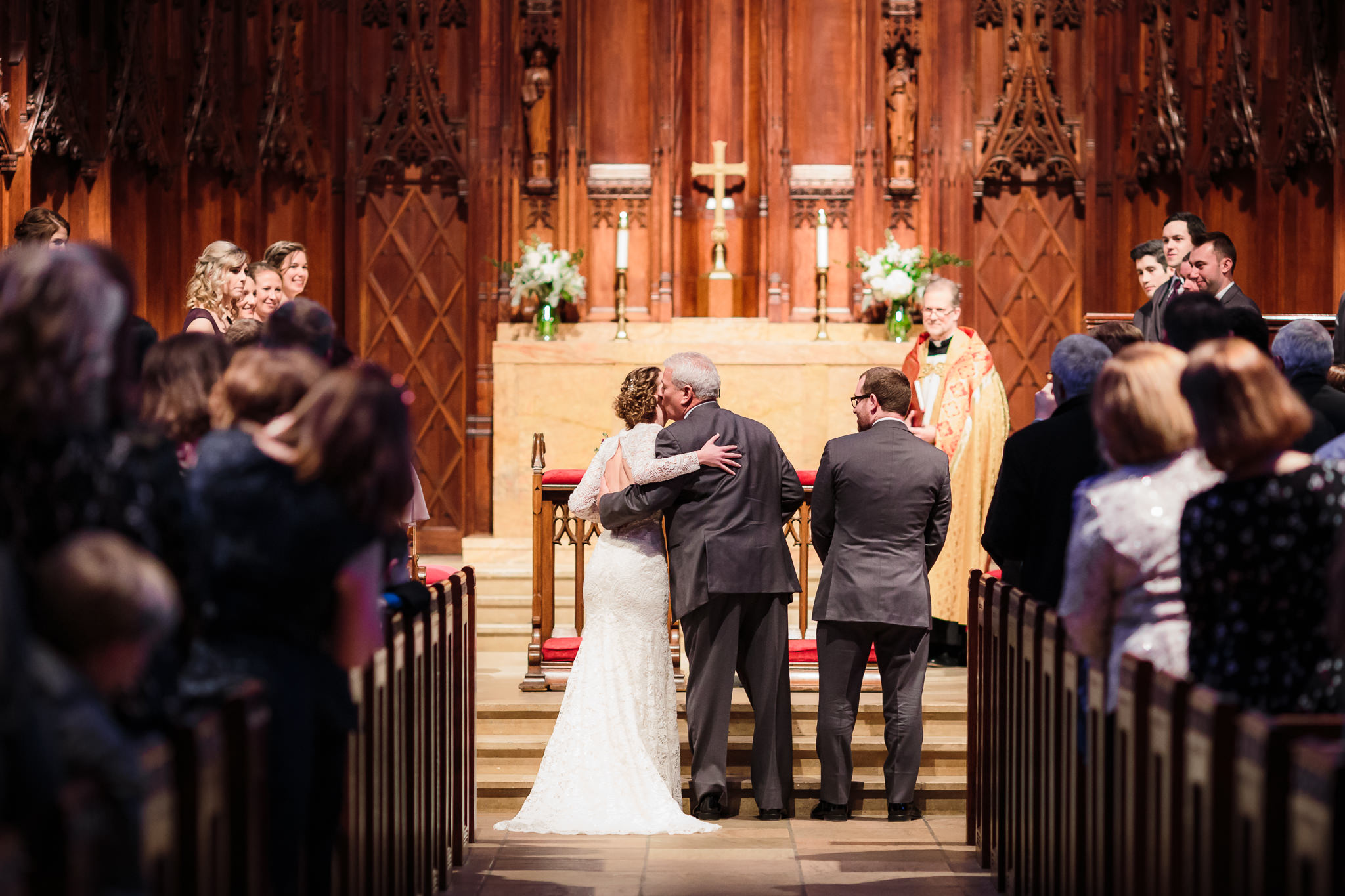 Father of the bride kisses her cheek as he gives her away at a Heinz Chapel wedding