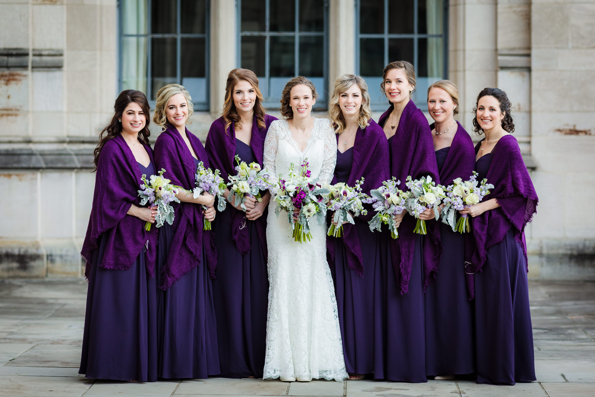Bridesmaids wearing purple Bill Levkoff dresses from Bridal Beginning after a Heinz Chapel wedding