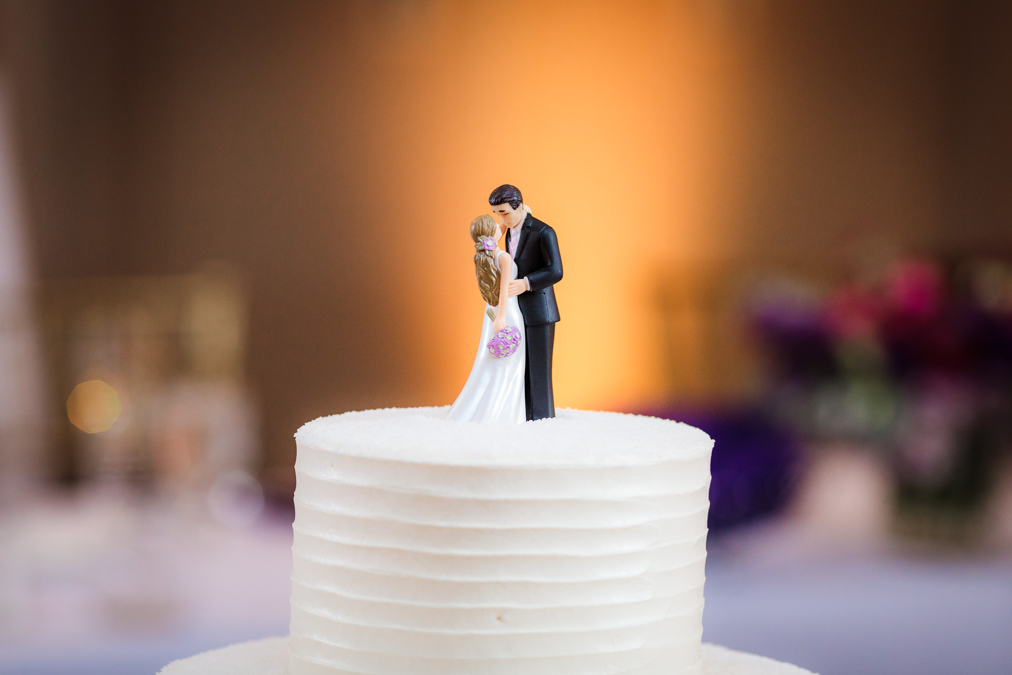 Bride & groom figurine cake topper on a Bethel Bakery wedding cake at DoubleTree Pittsburgh Downtown
