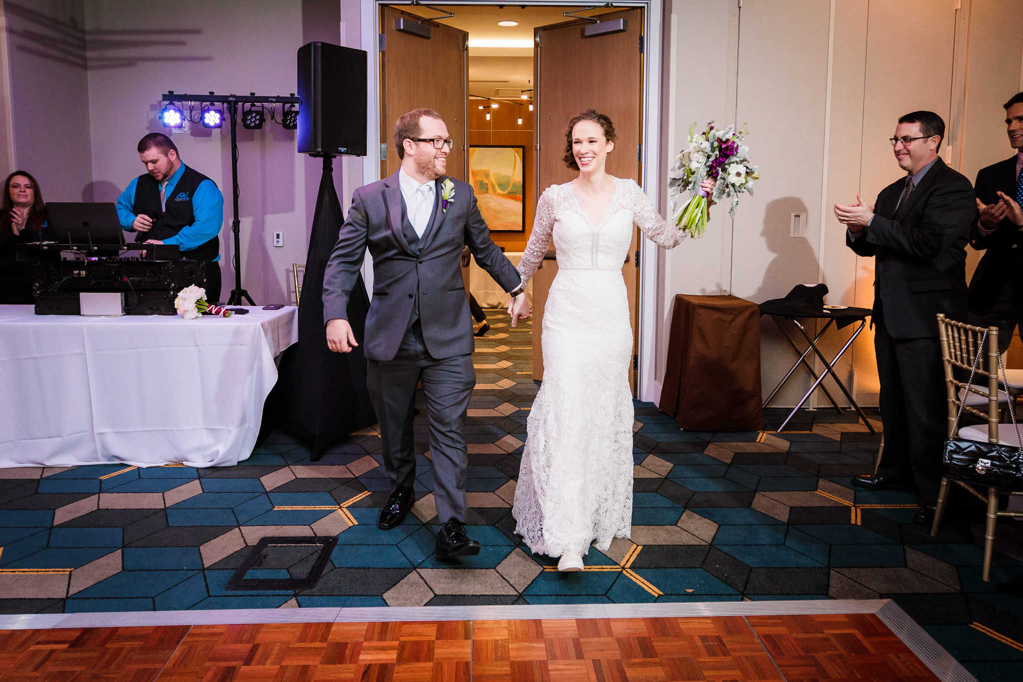 Newlyweds enter their reception at the DoubleTree Pittsburgh Downtown