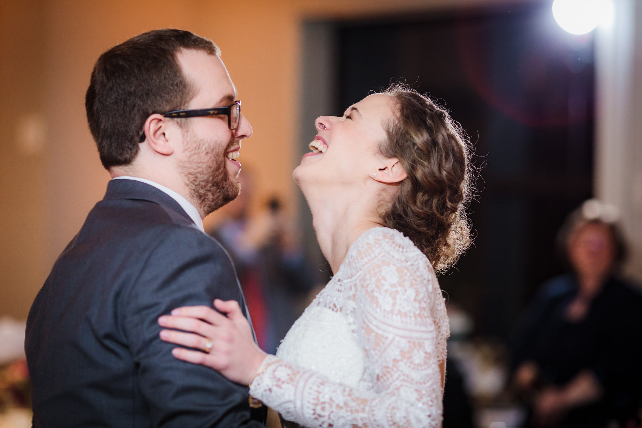 Bride & groom laugh during their first dance at the DoubleTree Pittsburgh Downtown